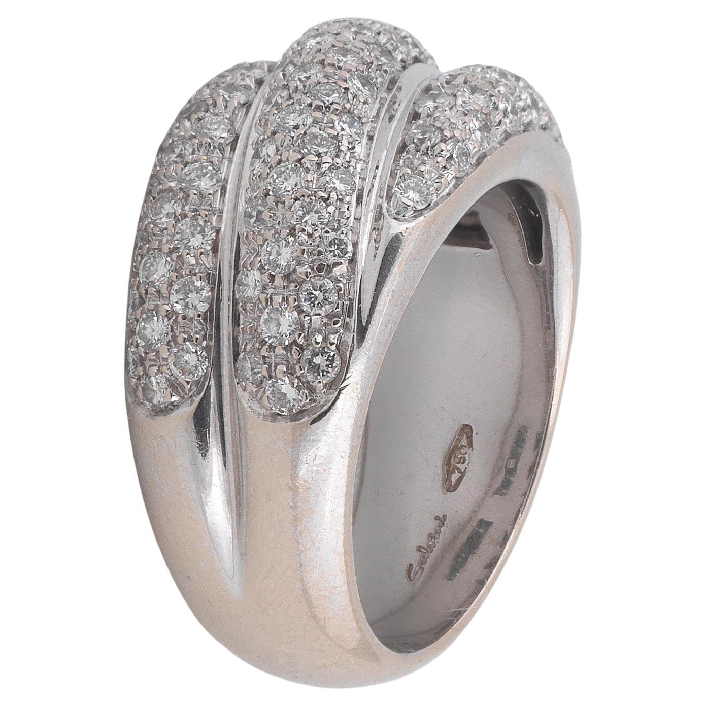 
From Salvini - Damiani jewelry house, a wide 18k Italian white Gold Diamond band.
Diamond Total carat weight of 2.55 carats, G color diamonds
The ring size is 7 , complimentary sizing upon ordering
