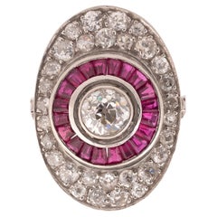 Bague en platine avec diamant taille ancienne de 1,25 carat et rubis ovale