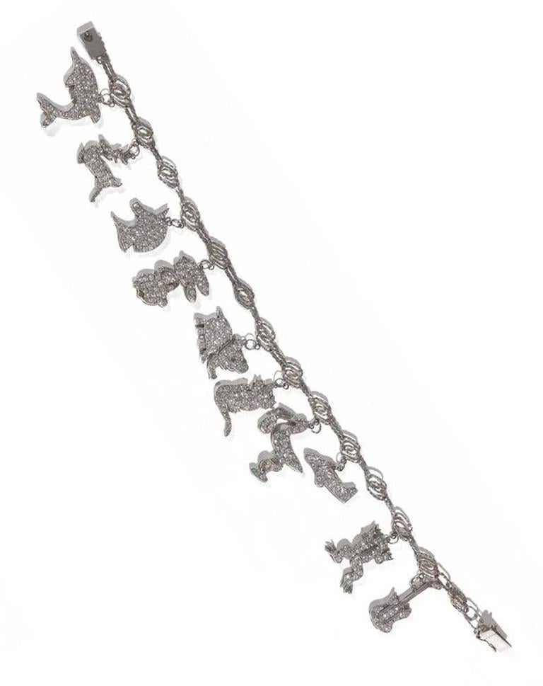 Diamond Platinum Charm Novelty Bracelet For Sale at 1stdibs