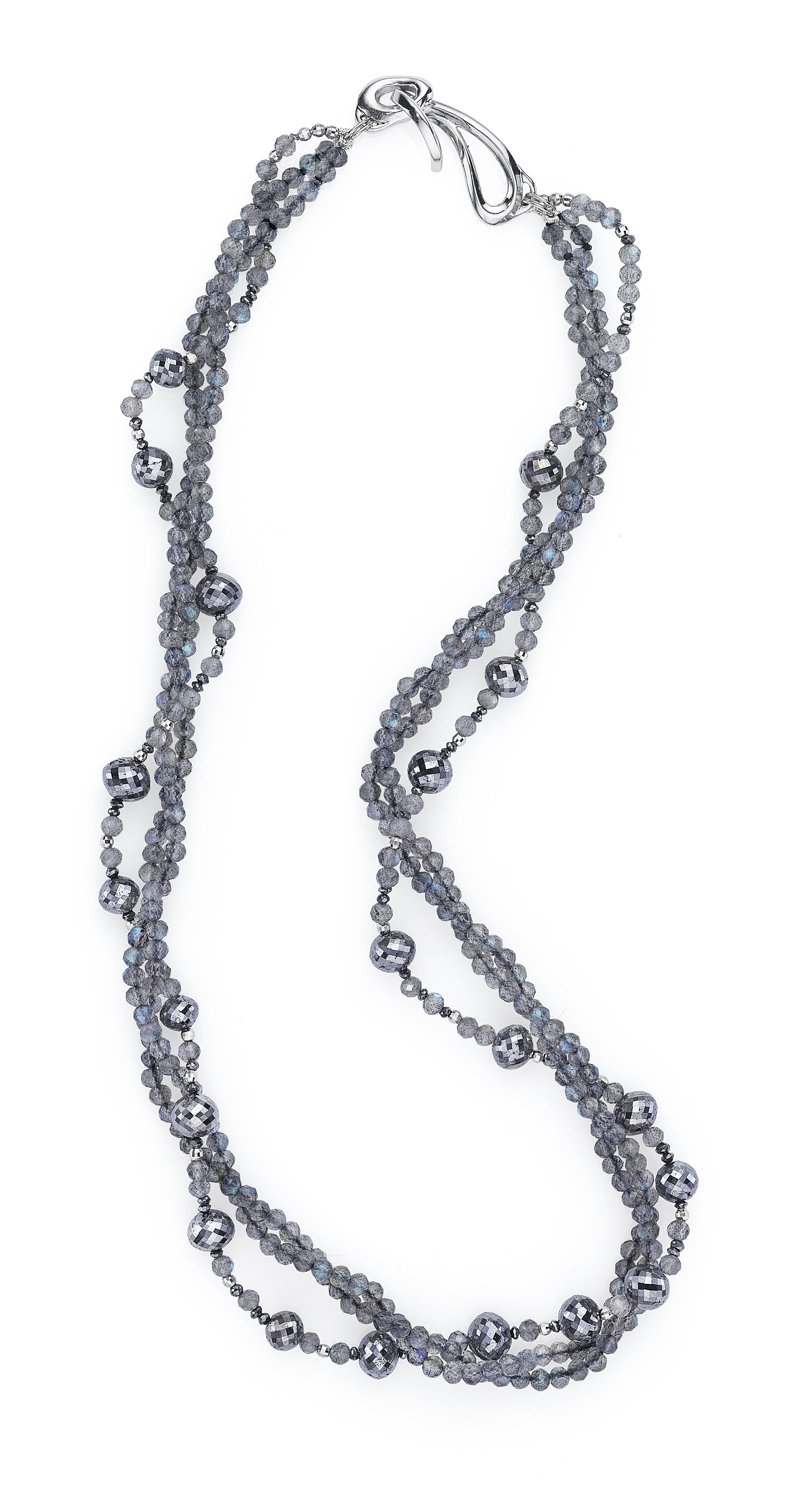 Gorgeous scintillating labradorite and 45 cts of black diamond beads strung with 14K mirrored white gold spacers. Finished with Sarna's signature clasp in 18K white gold. 

Labradorite beads: 3 mm
Large black diamond beads: 5.5-7 mm
Small black