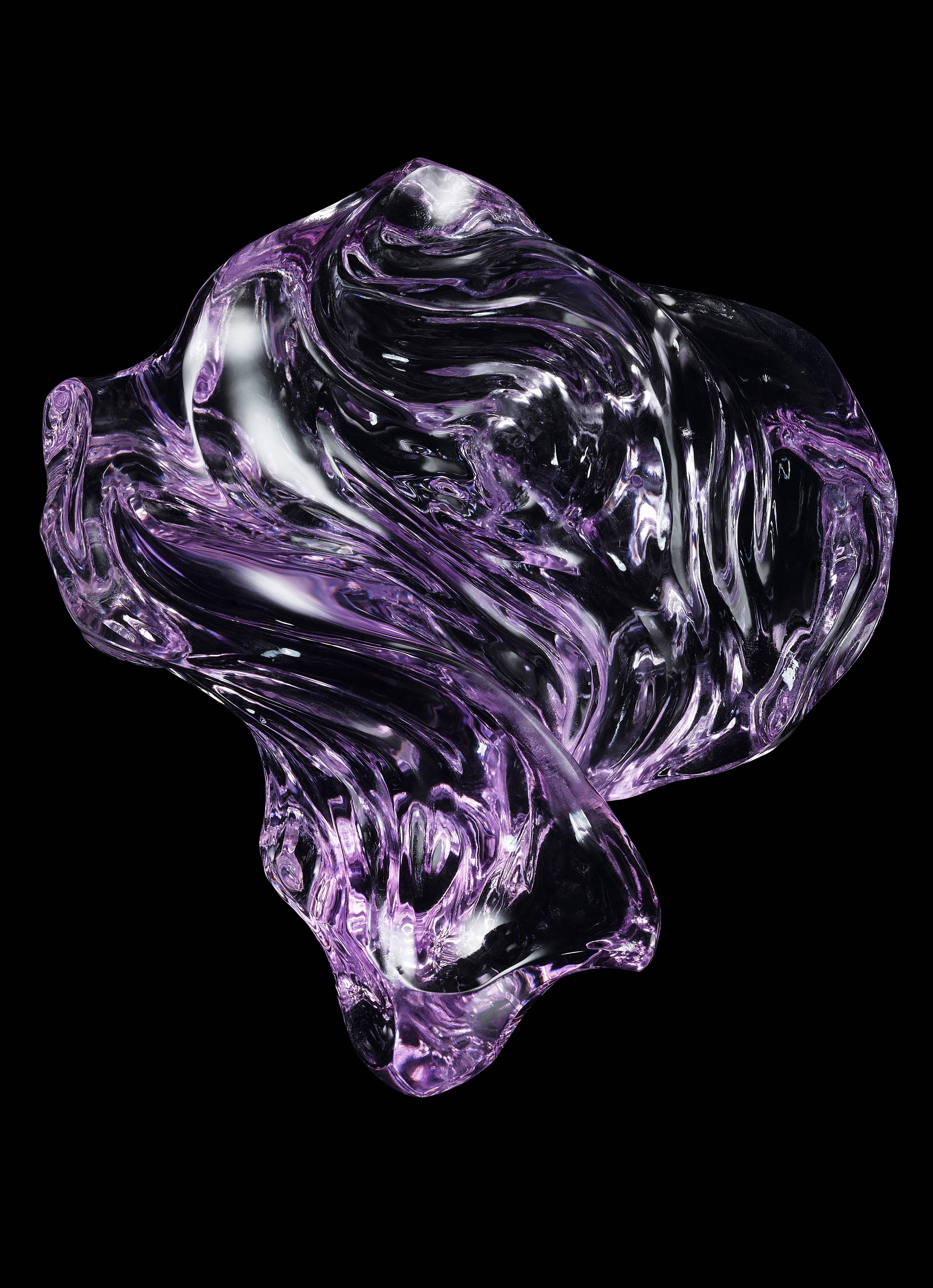 This stunning hand-carved 1015 ct Rose de France Amethyst is a one of a kind work of art. It was awarded First Place in Carving by the American Gem Trade Association, the most prestigious organization in the industry. 

It is mounted on a sterling
