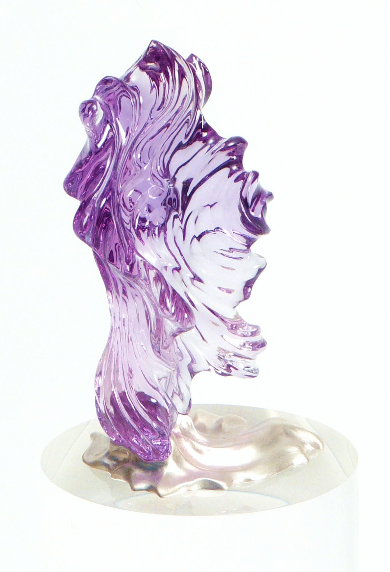AGTA award-winning hand carved 424 ct amethyst on a sterling silver base.

Internationally award winning designer Naomi Sarna creates gem carvings and jewels of unusual beauty. She is represented in the Smithsonian's Permanent Collection of