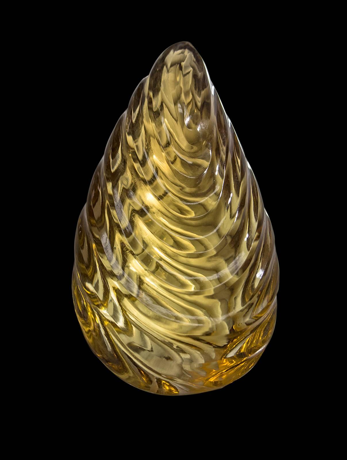 Beautiful hand-carved 104 ct citrine. Entirely one of a kind. 

Can be converted into a pendant upon request for additional cost.

Internationally award winning designer Naomi Sarna creates gem carvings and jewels of unusual beauty. She is
