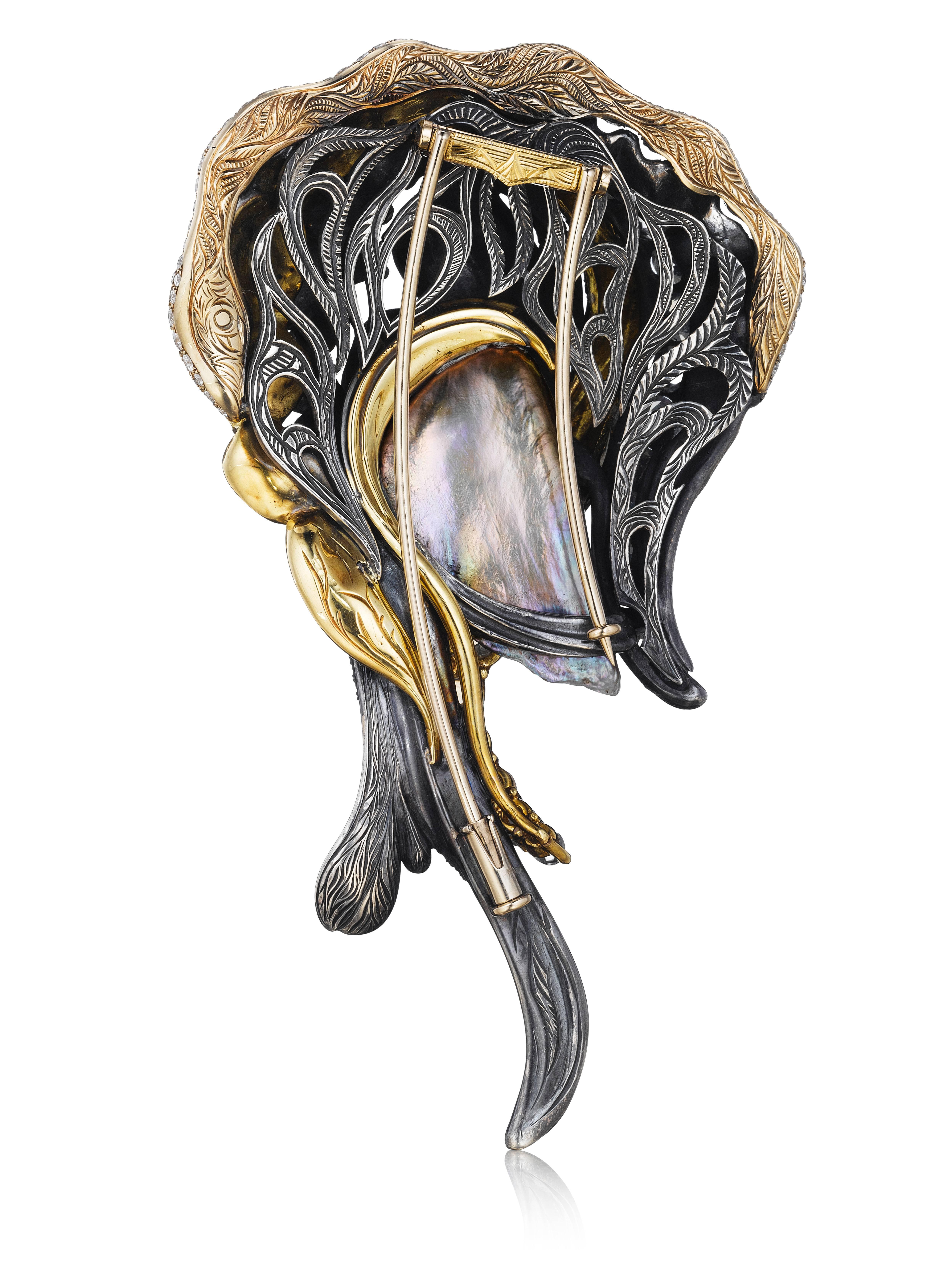 This magnificent one of a kind brooch features a natural GIA certified Chinese freshwater pearl. The pearl is accentuated with beautiful layers of platinum, 18K yellow gold, 18K white gold, and sterling silver. The various fine metals are set with
