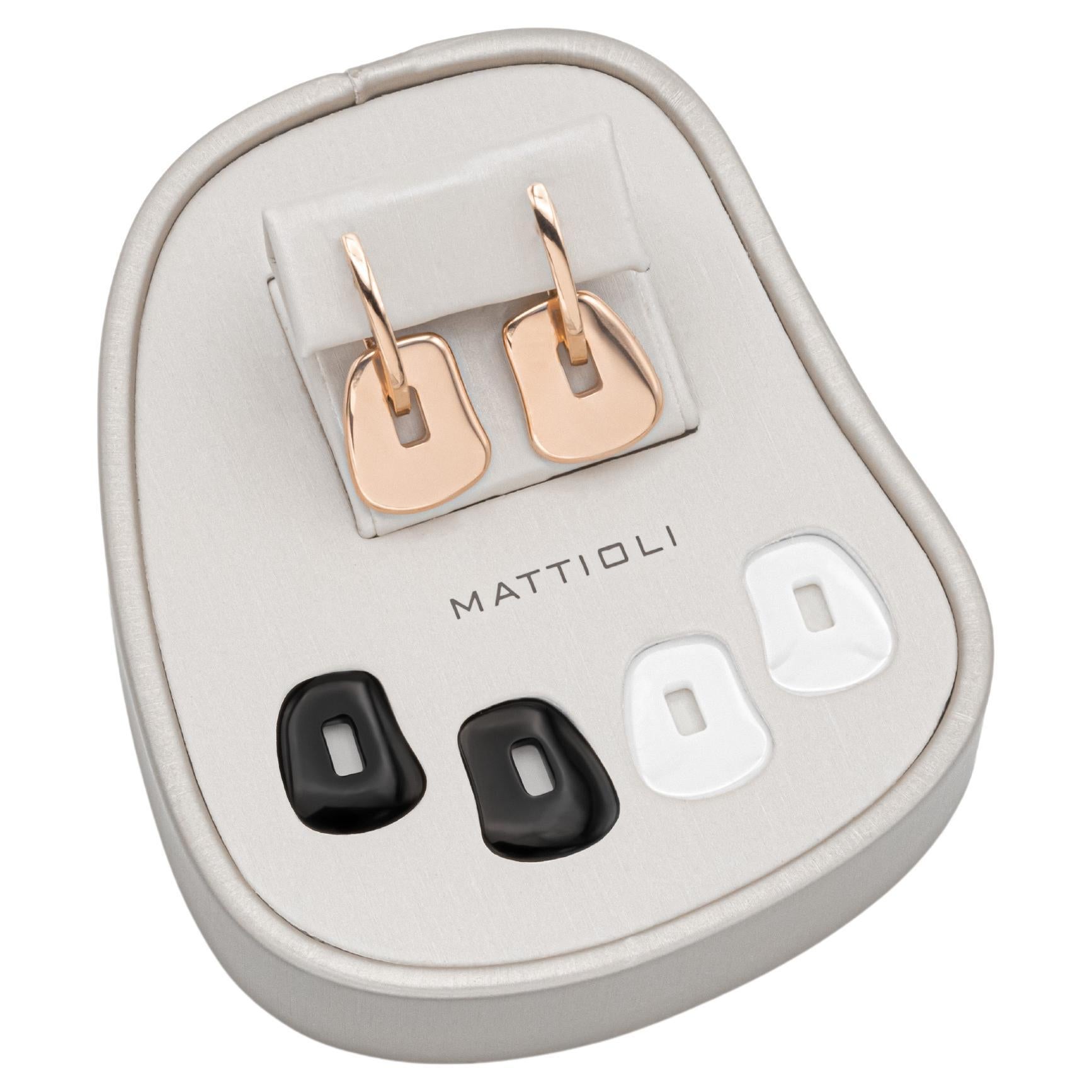 NEW Mattioli Puzzle Ceramic Small 18 Karat white Gold Earrings & 3 colour puzzles
gold (rose or yellow effect) and black and white ceramic 
Also available in Rose & Yellow Gold
The impressive effect of the ceramic makes these earrings a total gold