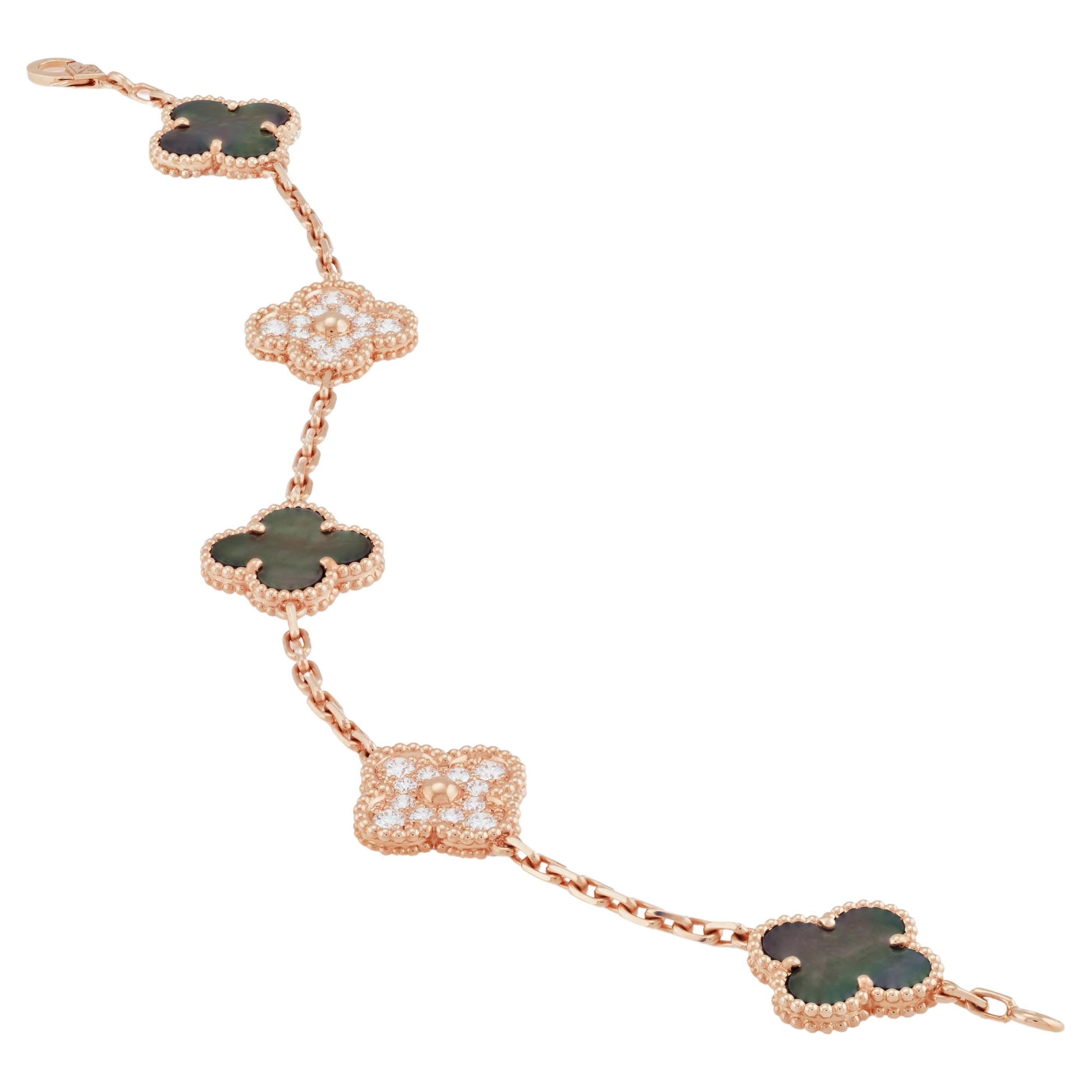 Van Cleef & Arpels Alhambra 5 motif Bracelet 18k Rose Gold diamonds & motherofpearl 
The bracelet is made in 18k rose gold and set with white diamonds that are D to F color and VS clarity. with 24 pave-set diamonds weighing approximately 1ct total