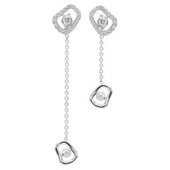 Orecchini Puzzle Diamonds Contrarié Mattioli in oro rosa o bianco e diamanti