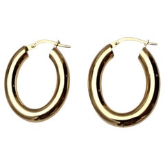 Boucles d'oreilles créoles ovales en or jaune 14 carats #25809
