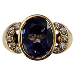Anello Movado in oro giallo 18 carati con iolite e diamanti, misura 9,25, certificato n. 26018