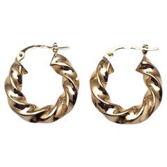 14K Yellow Gold Twisted Hoop Earrings #25699