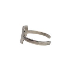 Bracelet manchette vintage H. Pozzo en argent massif, de forme rectangulaire ouverte, n° 26832
