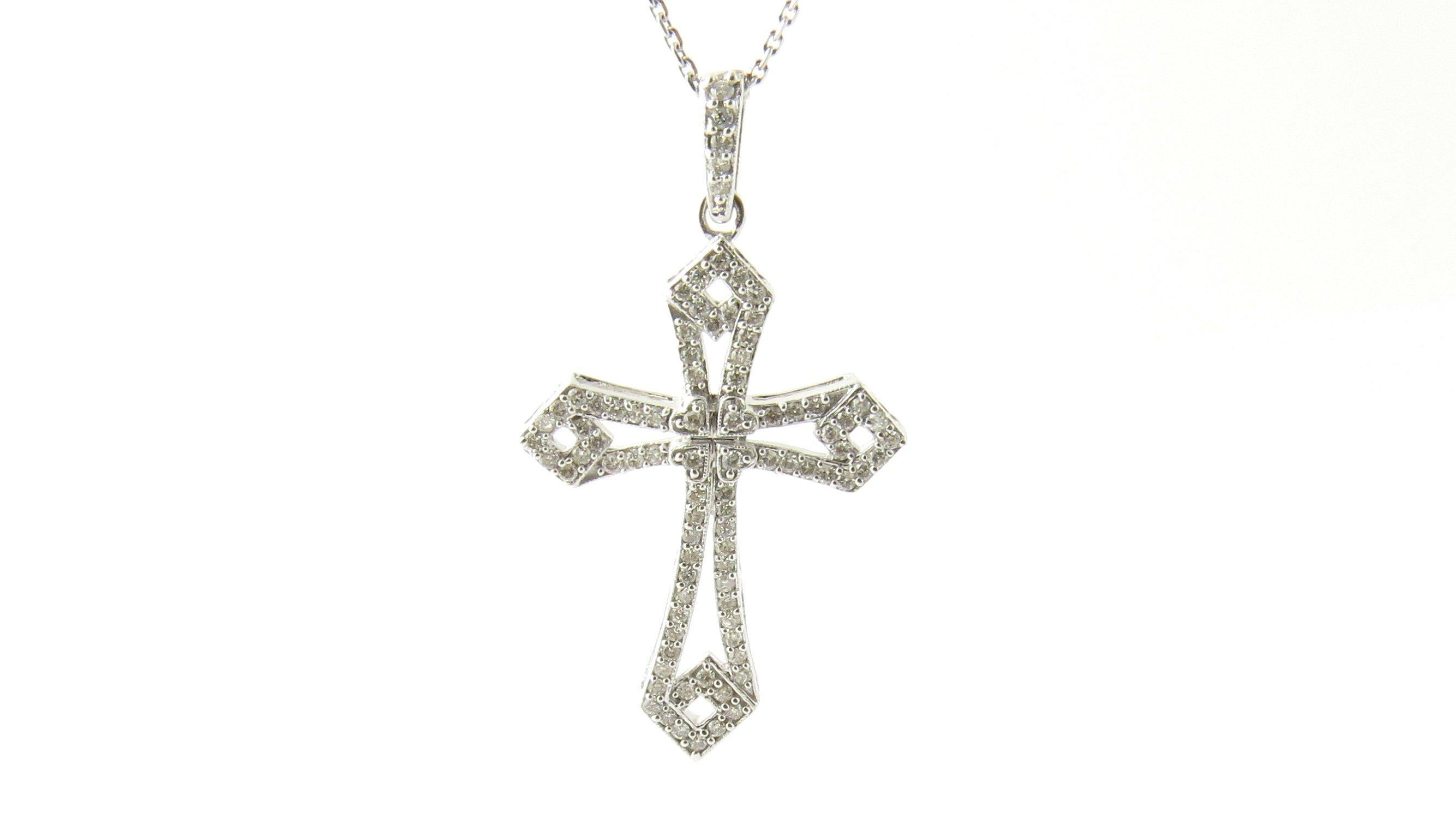 white gold cross pendant with diamonds