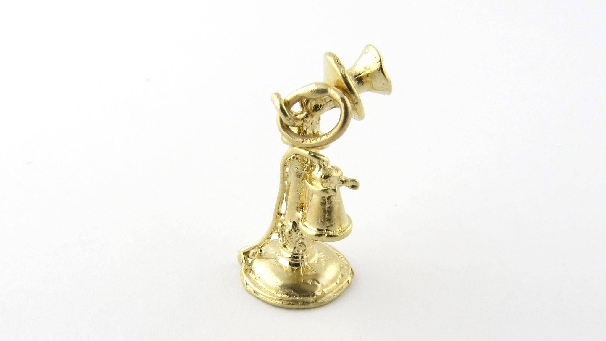 Vintage 14K yellow gold candlestick charm. 

Please call! Common from the late 1890s to the 1940s, the stick phone features a mouth piece mounted at top and the receiver to hold to by the hand while talking. 

Marked: 14K on bottom Marked: NJ 14K on