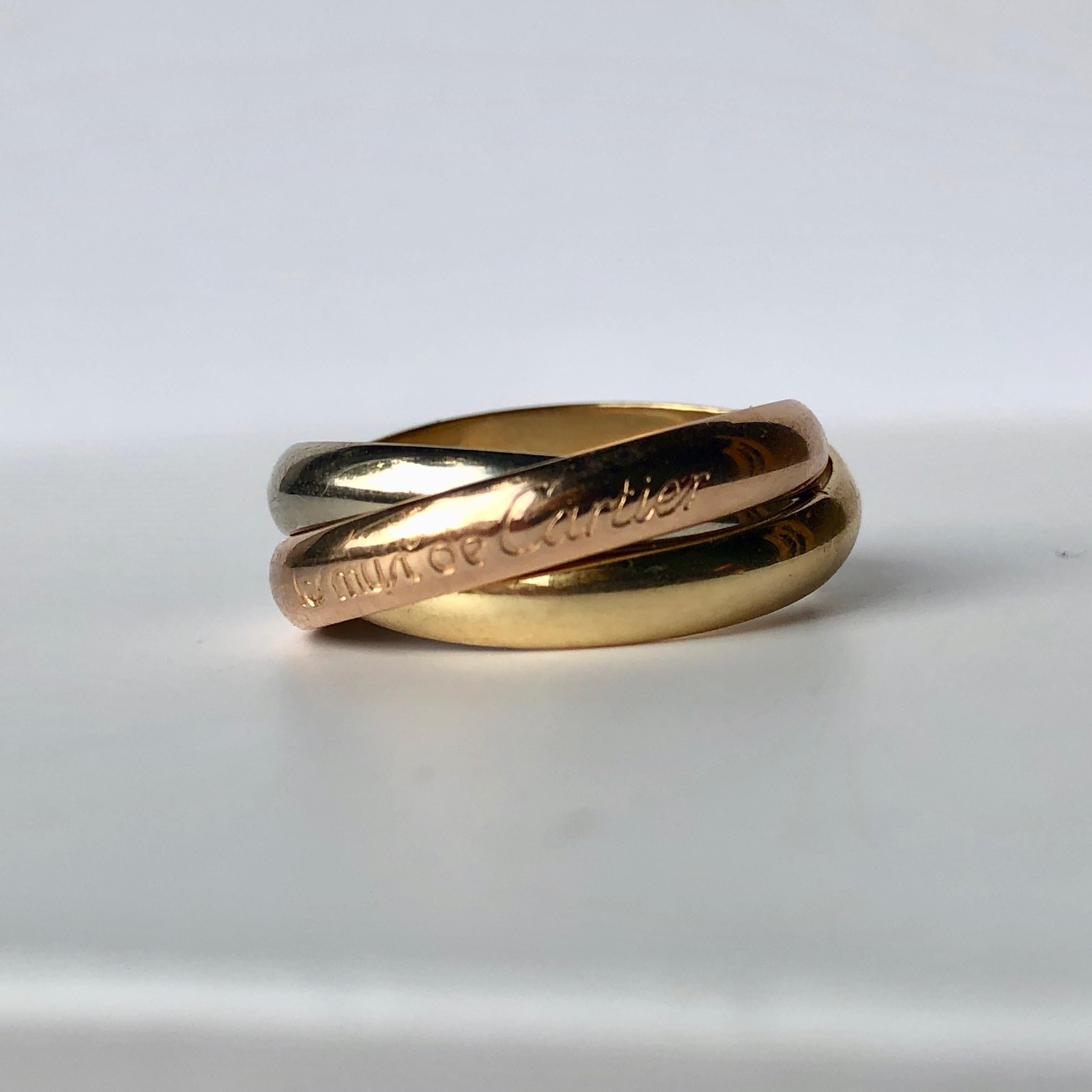 A Cartier 3 Colour Gold Russian Wedding Ring

The Trilogy Ring For Past, Present, Future

Size O

Worldwide Shipping 

Next day Dispatch 

Full Returns Policy 