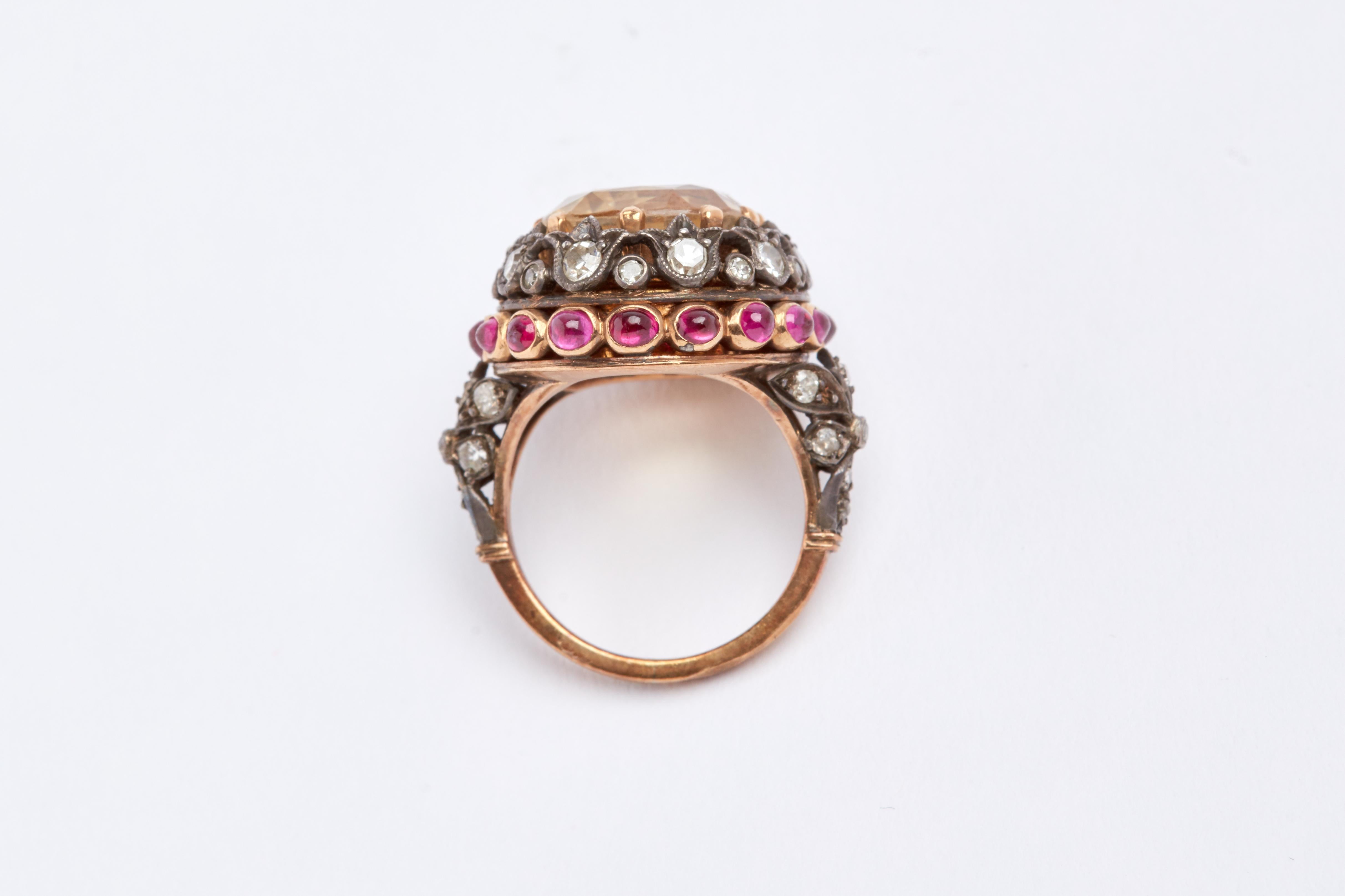 Yellow Gold sapphire, white diamonds and cabochon rubies ring. Size 7