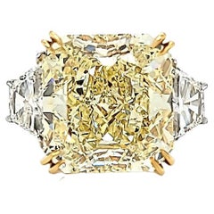 Louis Newman 7 Co GIA Certified 15.06 Carat Fancy Yellow Three-Stone Ring