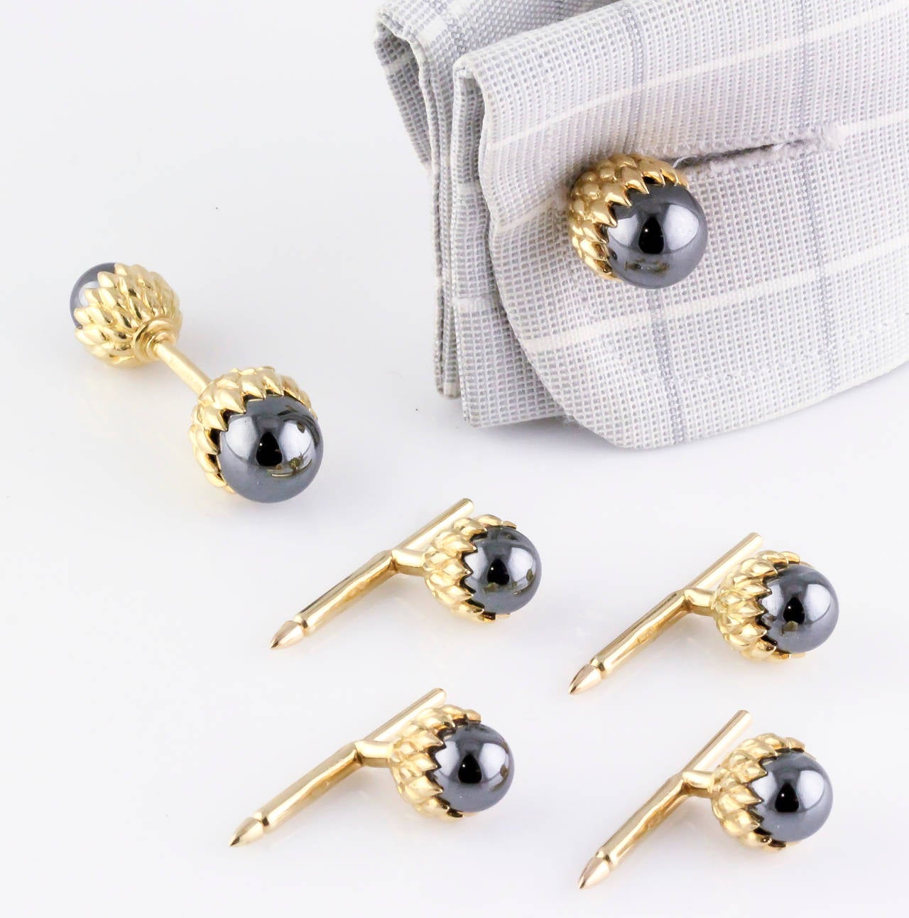 Tiffany & Co. Schlumberger Hematite Gold Acorn Cufflink Stud Set In Excellent Condition In New York, NY