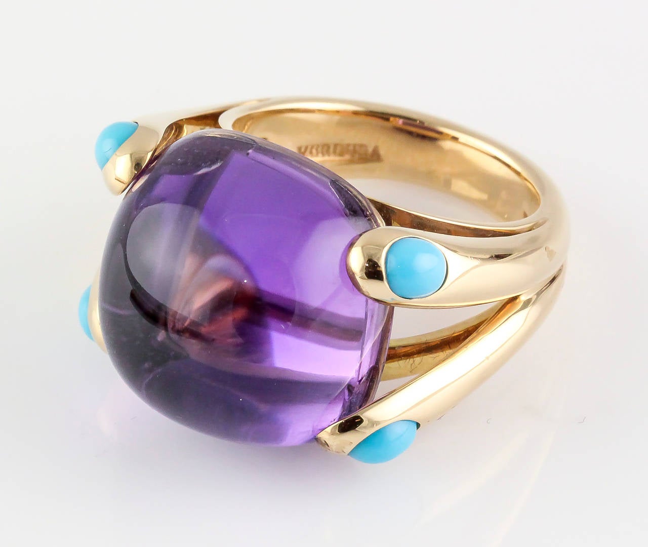 Vibrant amethyst, turquoise and 18K yellow gold ring from the 