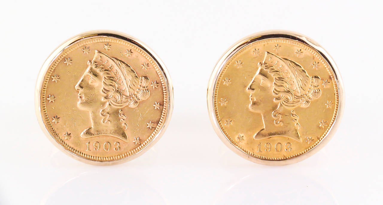 Historic cufflinks featuring the Liberty Head $5 gold coin in a 14K yellow gold setting. The Liberty Head coin is made of .900 gold and is dated 1903.
Hallmarks: 14K