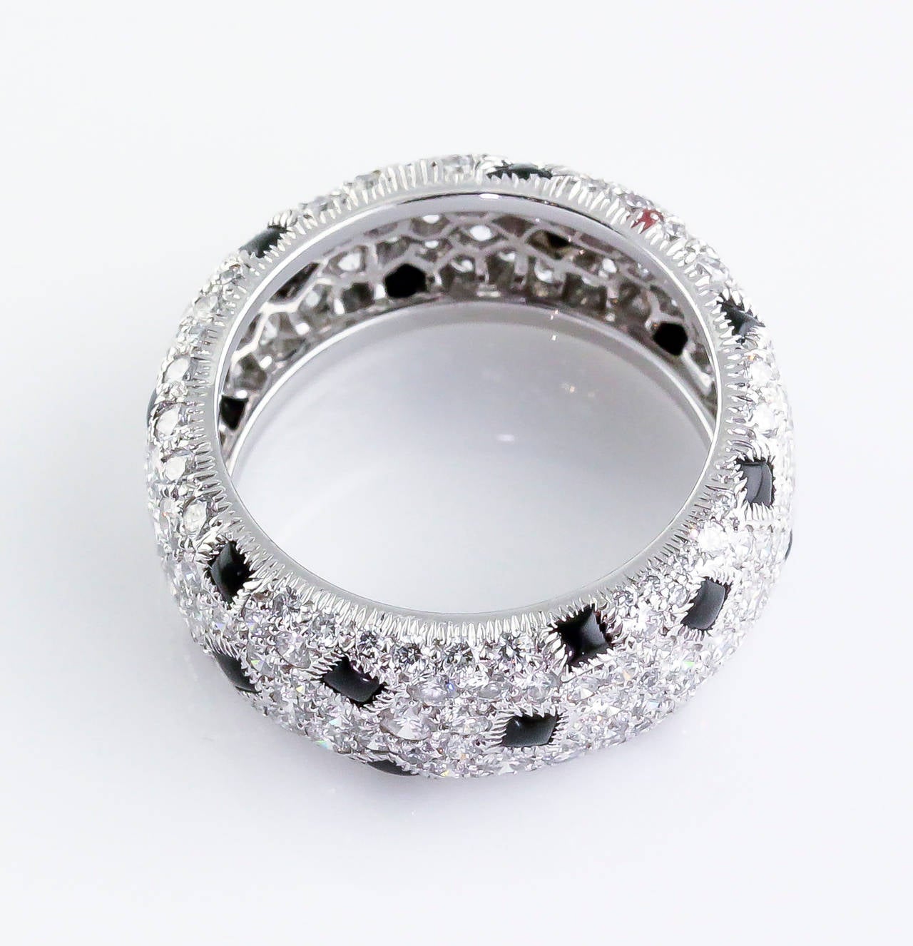 Elegant diamond, onyx and 18K white gold band from the 