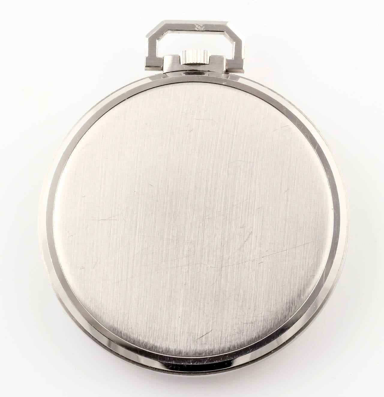 Elegant diamond and platinum pocket watch by Patek Philippe, circa 1960s. It features very high grade round and baguette cut diamonds at each hour. Manual wind movement.  Ref. 600. Recent model sold for over $21000 at Christie's Watches online