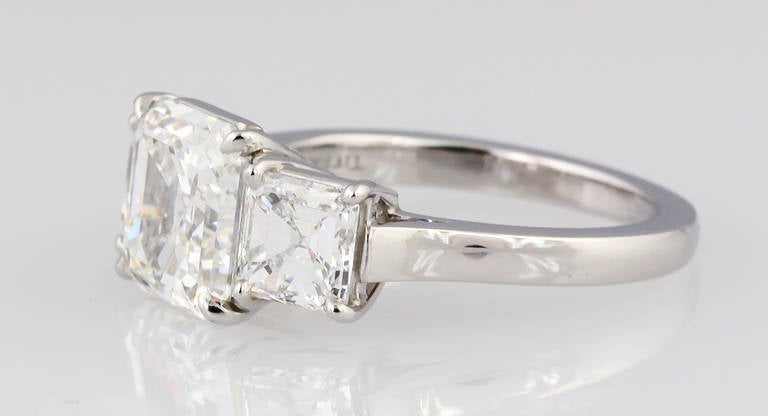 Tiffany and Co. Three-Stone Diamond Platinum Engagement Ring at 1stDibs