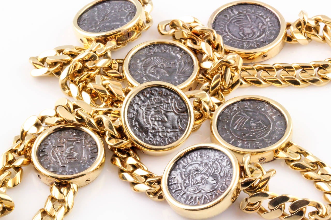 Chic and unusual 18K yellow gold and ancient coin link necklace by Bulgari. 

Hallmarks: Bulgari, Italy, 18k.
