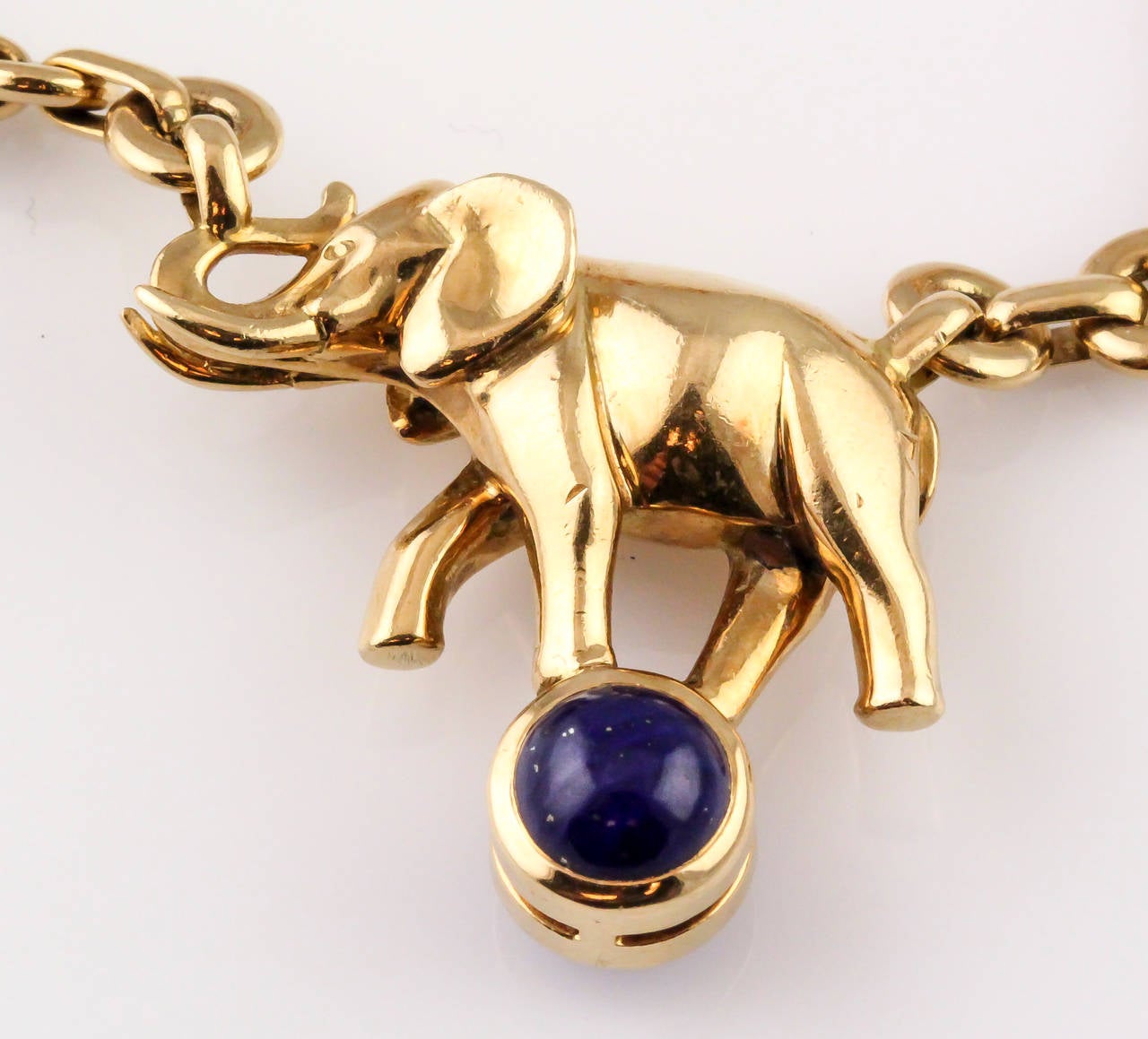 Cartier Coral Lapis Gold Animal Charm Necklace In Excellent Condition In New York City, NY