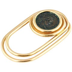 Clip en or Bulgari avec pièce de monnaie ancienne