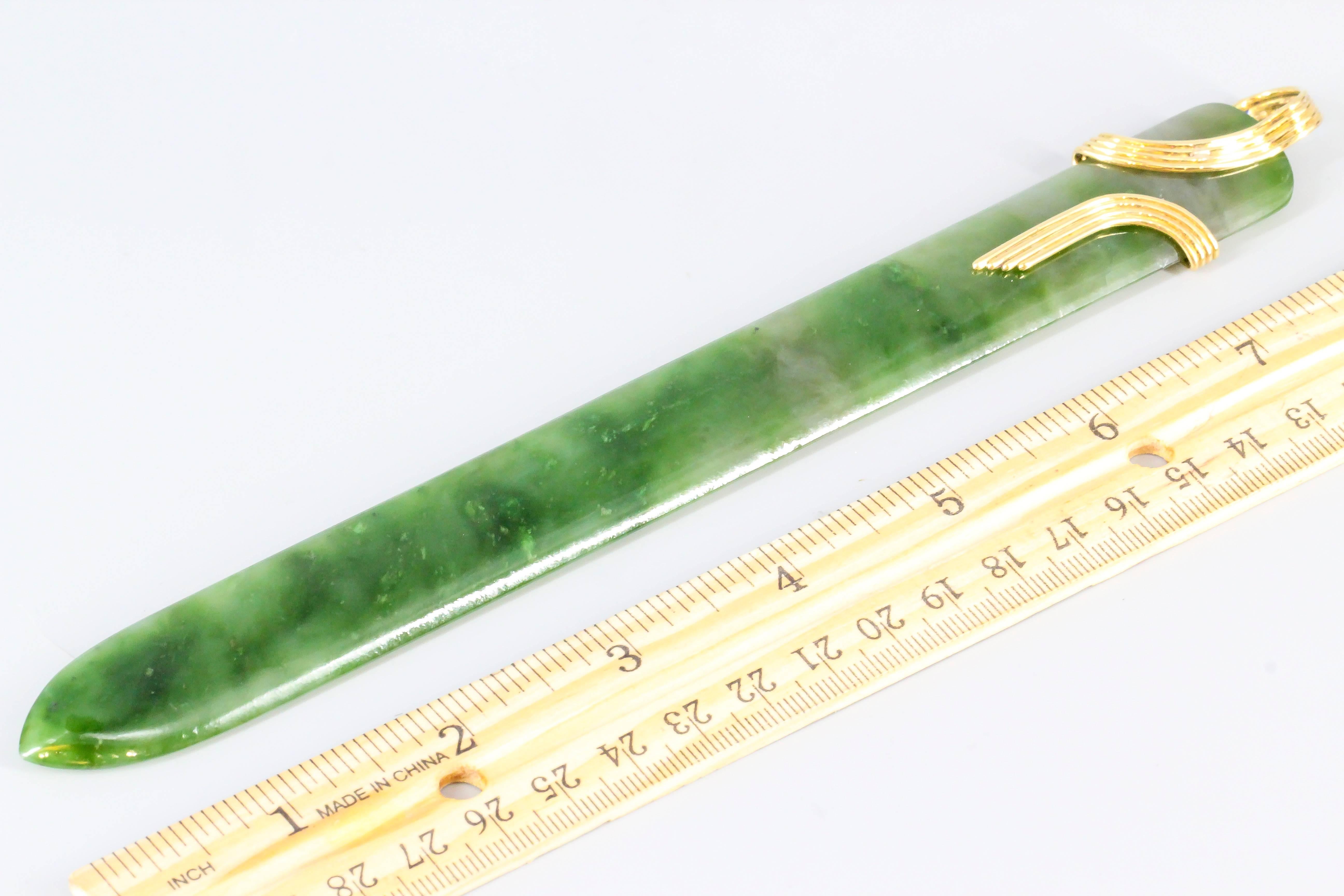 Rare and unusual nephrite and 18K gold letter opener by Tiffany & Co. Schlumberger. 

Hallmarks: Tiffany & Co., Schlumberger, 18k.
