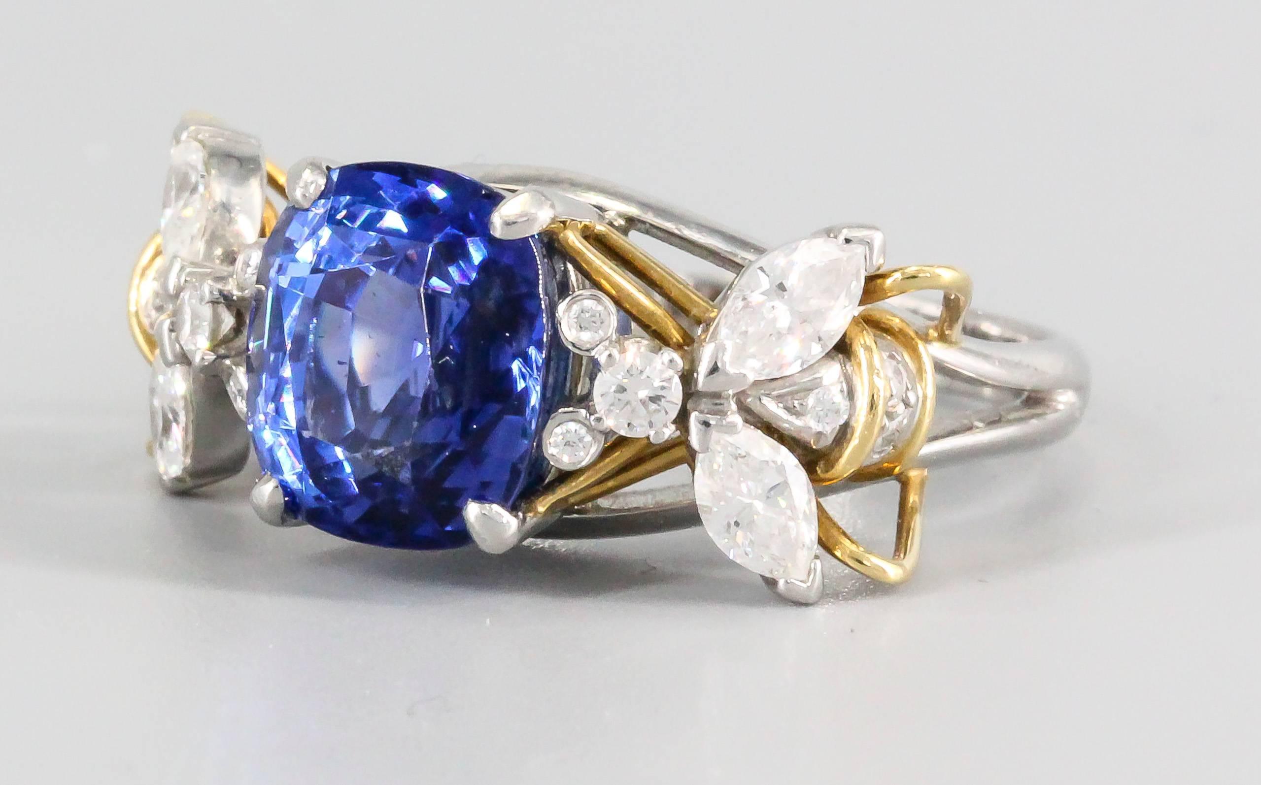 Stylish sapphire, diamond, platinum and 18K yellow gold ring, known as the  