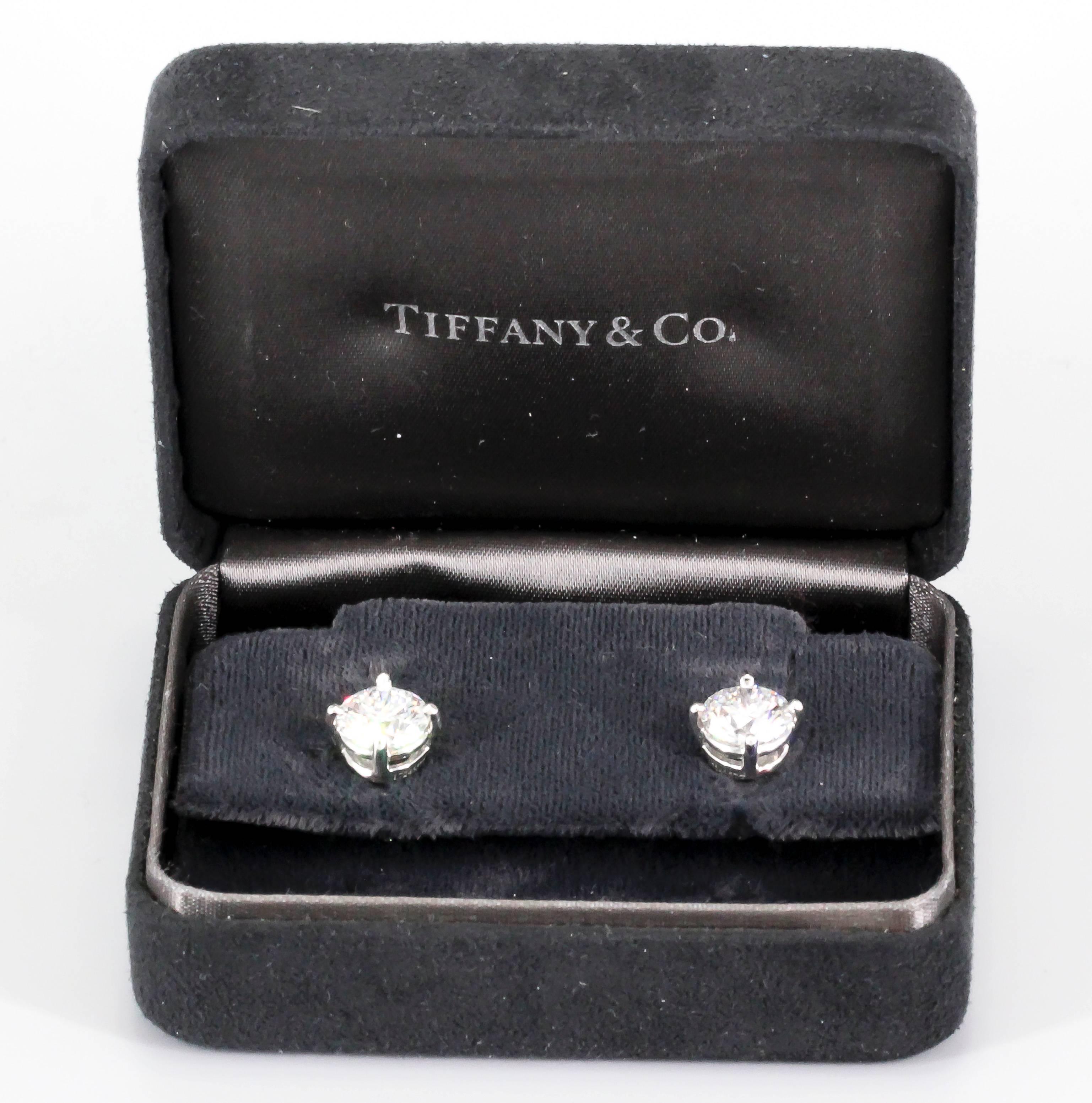 Important diamond and platinum studs by Tiffany & Co. They feature two very high grade stones, each with Excellent cut, polish, and symmetry;  both E color: one 2.32cts VS1 clarity, the other 2.31cts VVS2 clarity, total carat weight of 4.63 carats.