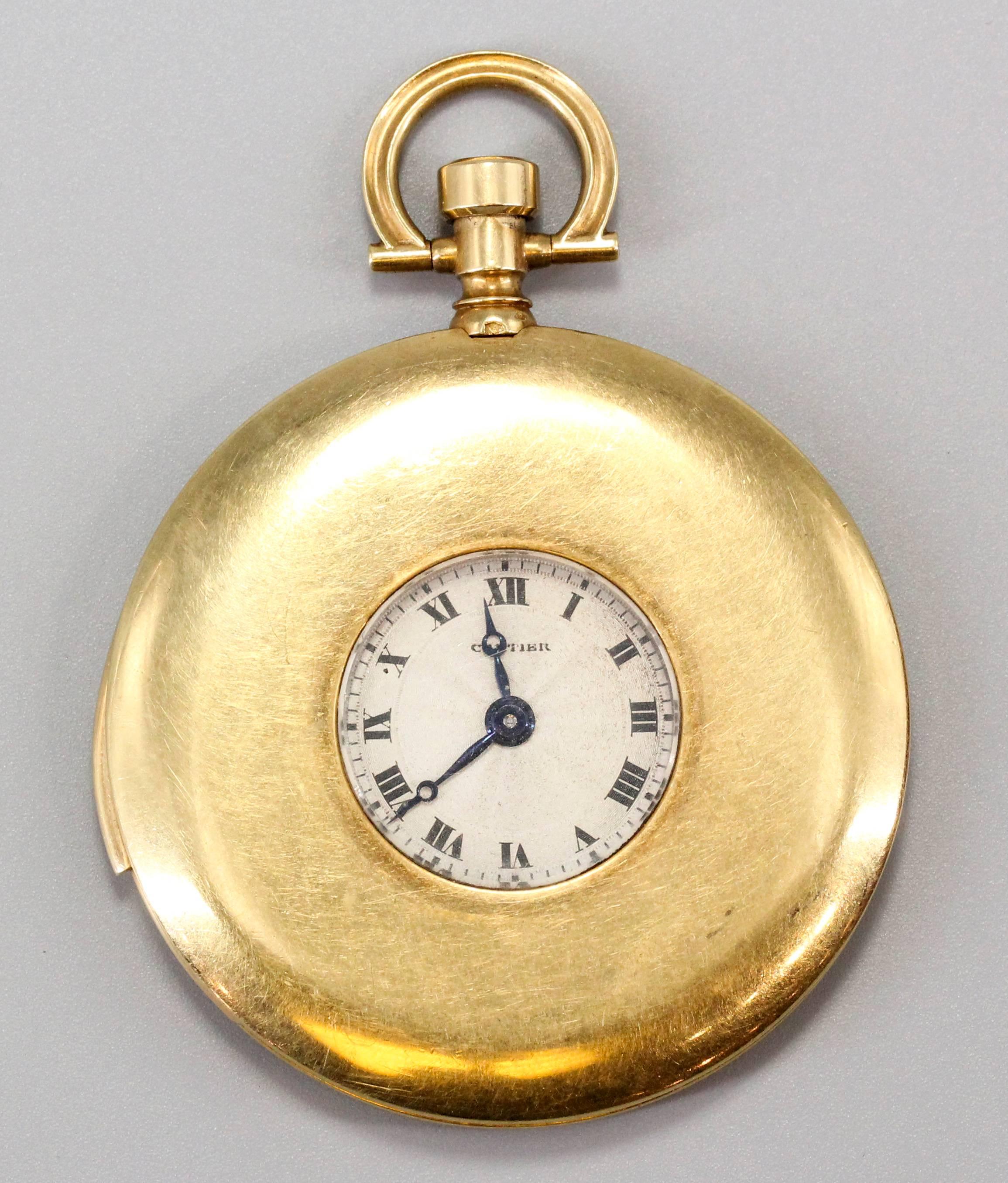 Very fine and rare 18k yellow gold minute repeater pocket watch by Cartier, circa 1910. It features a very slim case, a minute repeating mechanism by EWC (European Watch & Co.), and with spring loaded sliding shutter aperture, also known as the