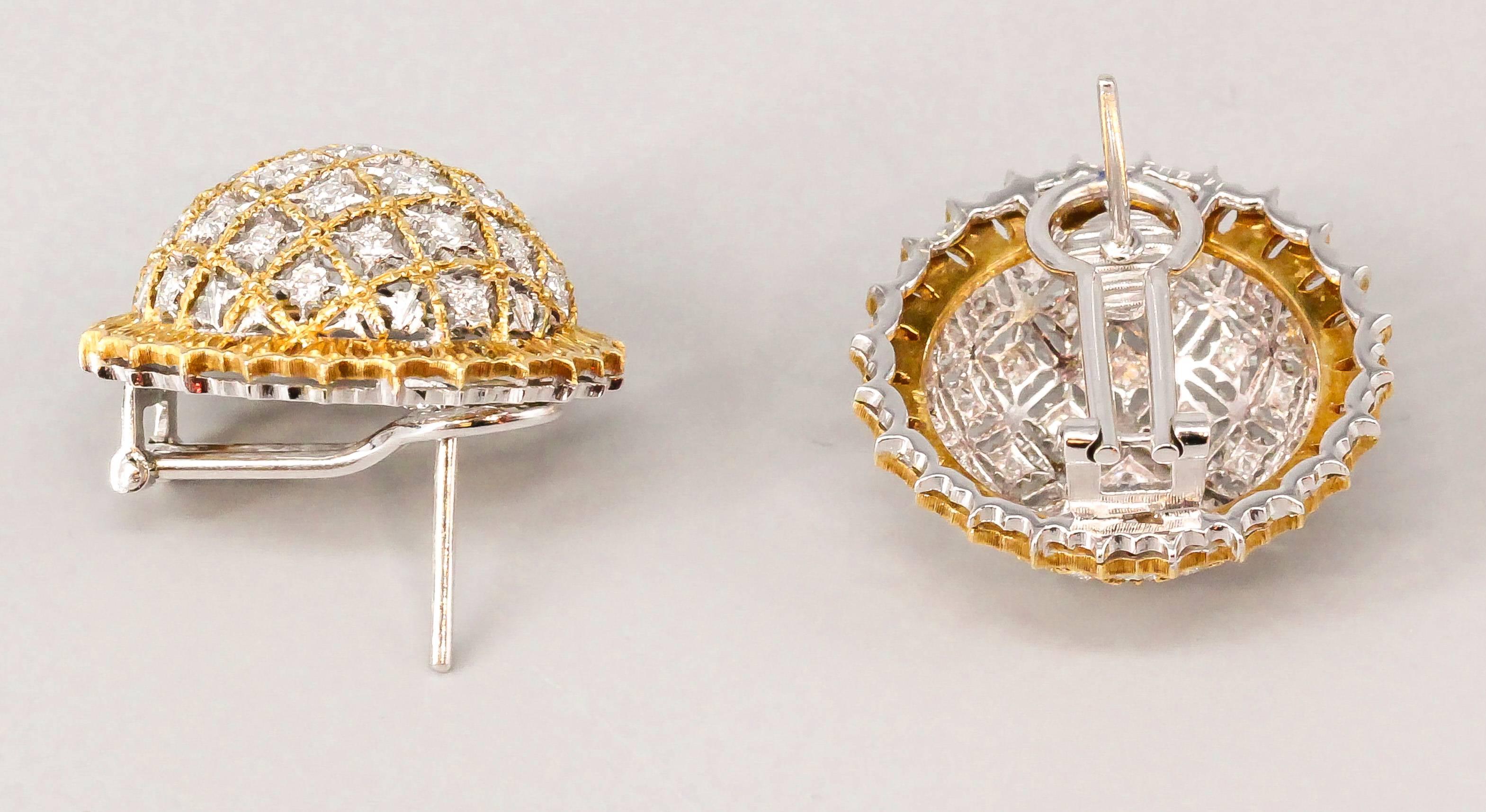 Elegant and intricate large diamond and 18K yellow & white gold dome earrings by M. Buccellati. They feature high grade round brilliant cut diamonds throughout the dome, with intricate yellow gold around the edge and white gold as the rest of the
