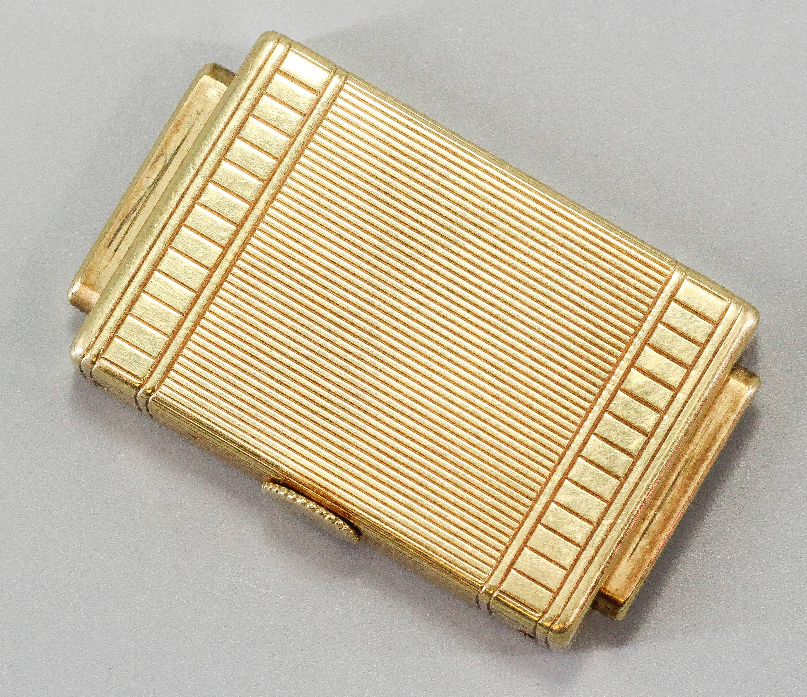 Rare and unusual 18K yellow gold traveling shutter watch by Cartier, circa 1920s. Features a shutter aperture mechanism that reveals the Cartier dial with roman numberals. Mechanical winding movement made by EWC (European Watch & Clock Company).