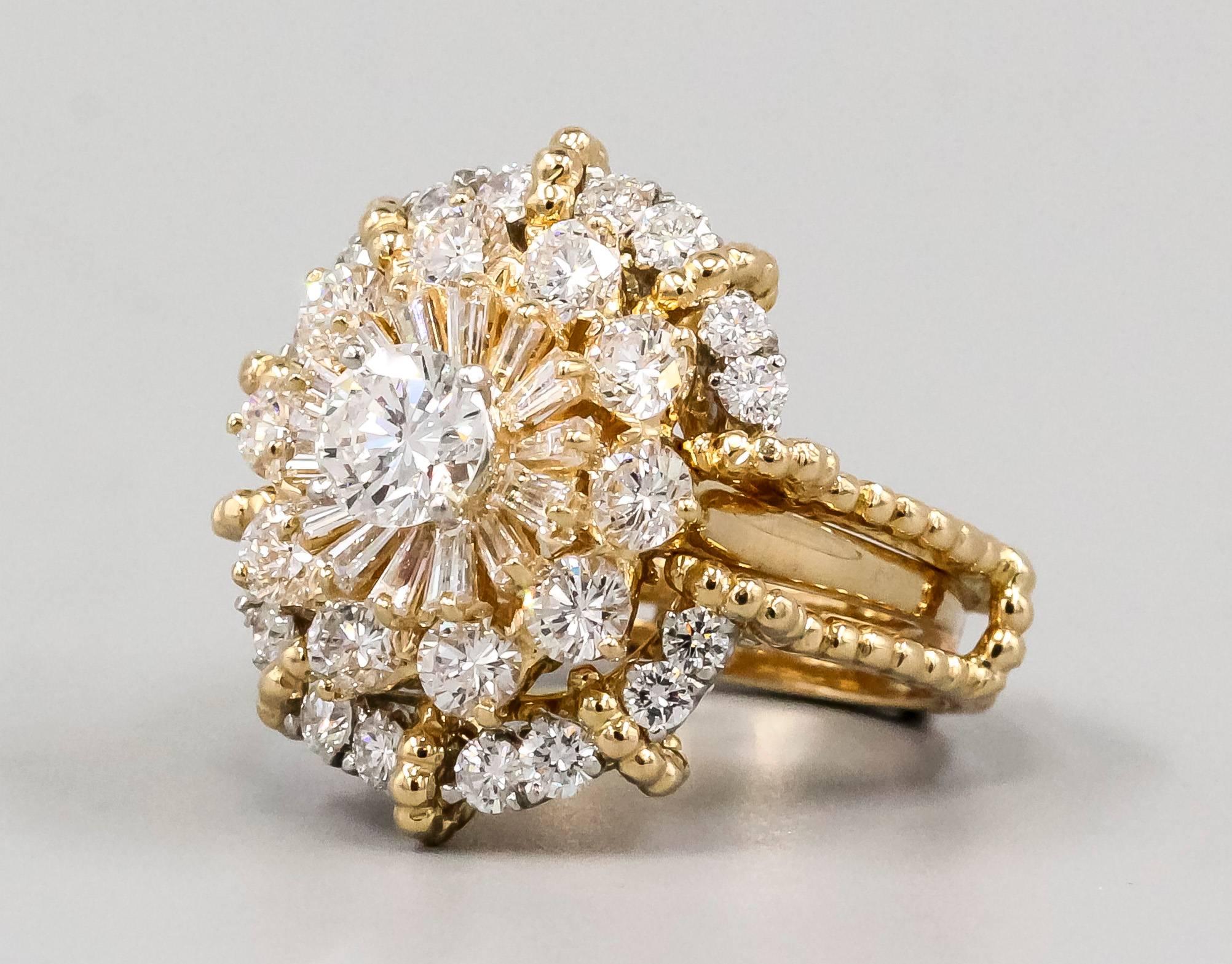 Elegant diamond ring in platinum and 18K yellow gold by Oscar Heyman. It features two rings, an inner or main ring and its outer jacket. The 