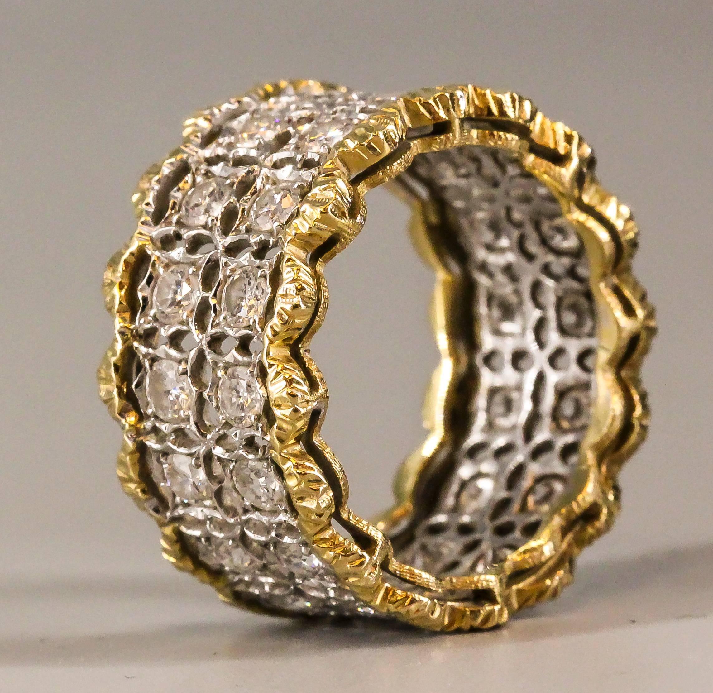 Elegant diamond, platinum and 18K yellow gold wide band by Gianmaria Buccellati. It features high grade round brilliant cut diamonds over a platinum setting, with 18K yellow gold borders on both ends in typical Buccellati fashion. Beautiful