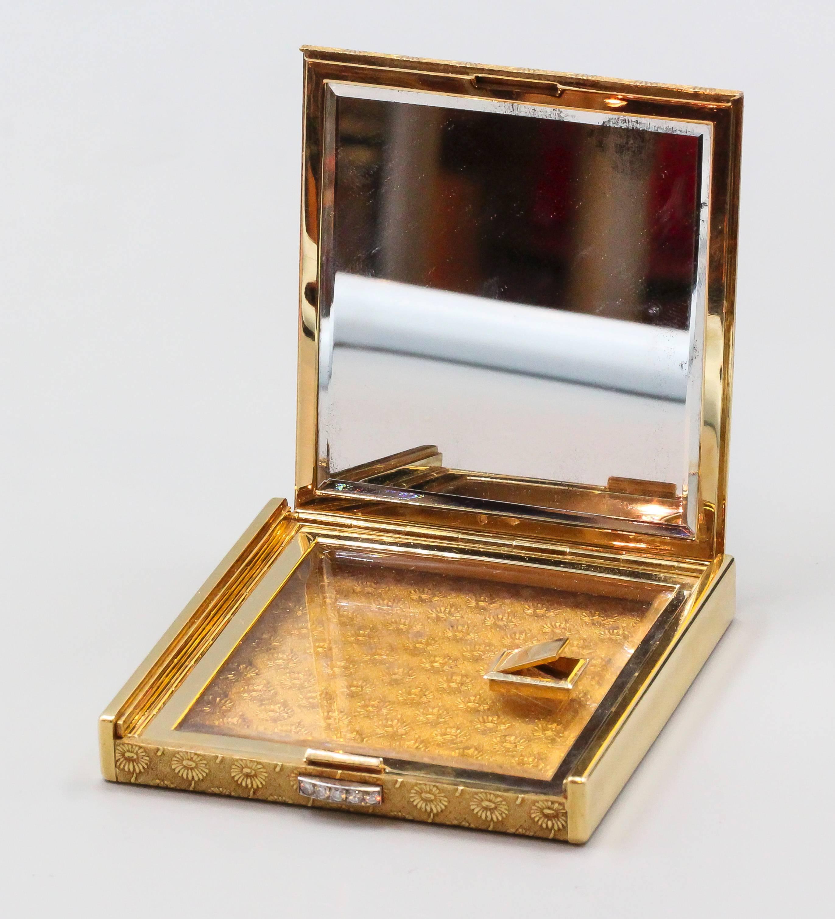 Stunning diamond and 18K yellow gold textured compact case by Boucheron, circa 1960s. It features an expertly made textured flower motif throughout each side. Diamonds are high grade round brilliant cut diamonds, bezel set throughout the top.