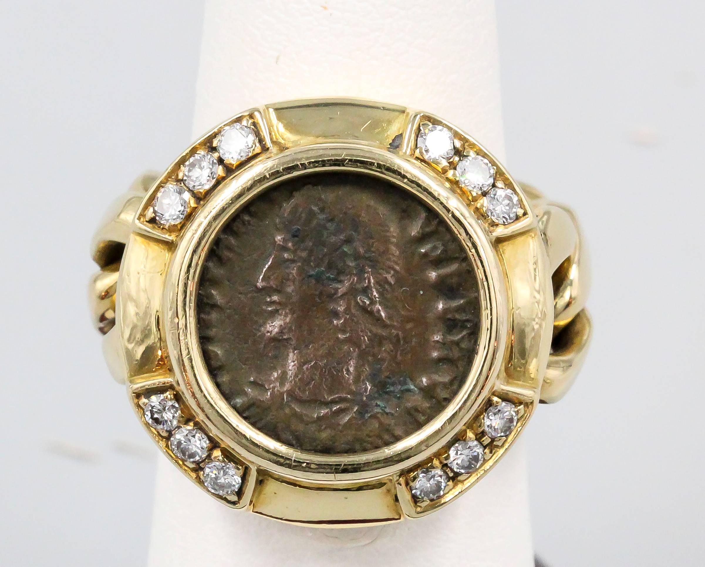 Rare and unusual diamond, ancient Roman coin and 18K yellow gold flexible ring by Bulgari, circa 1970s. It features a Roman coin dated 361 A.D. - rule of Constantius II. Diamonds are high grade round brilliant cut. Beautifully made and easy to wear.