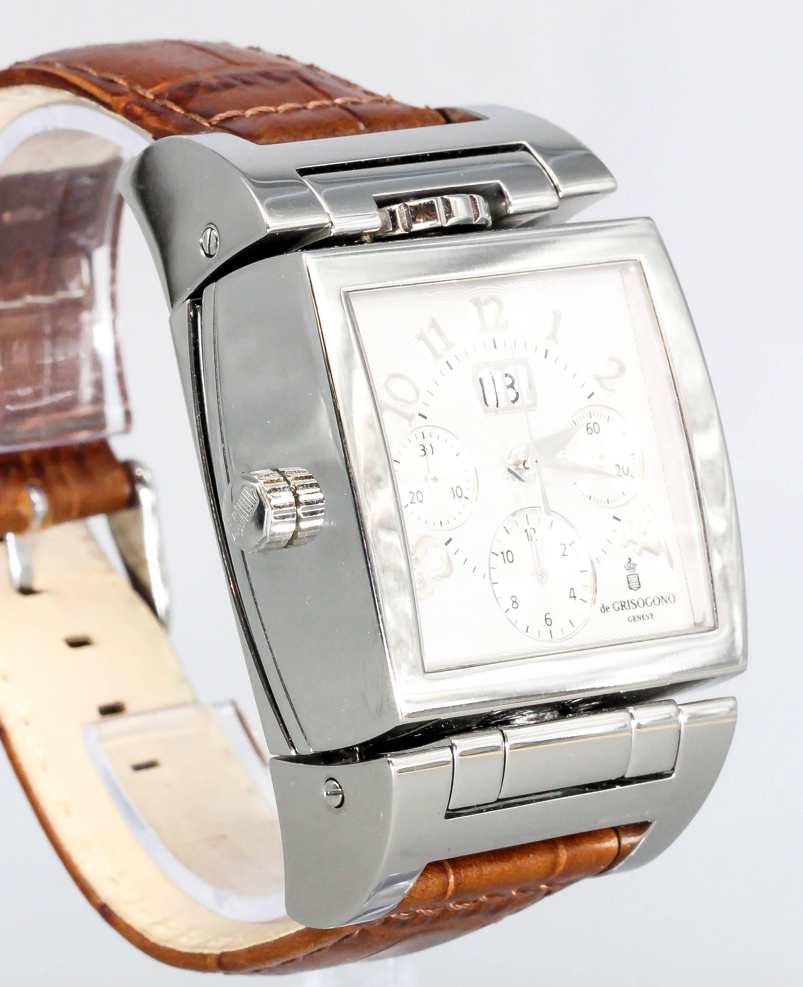 Handsome stainless steel wrist watch by De Grisogono, known as the Instrumento Doppio. It features a chronograph function, second time zone on the reverso face, and a large date near the 12 o'clock marker.  Can be worn with both faces, and can be