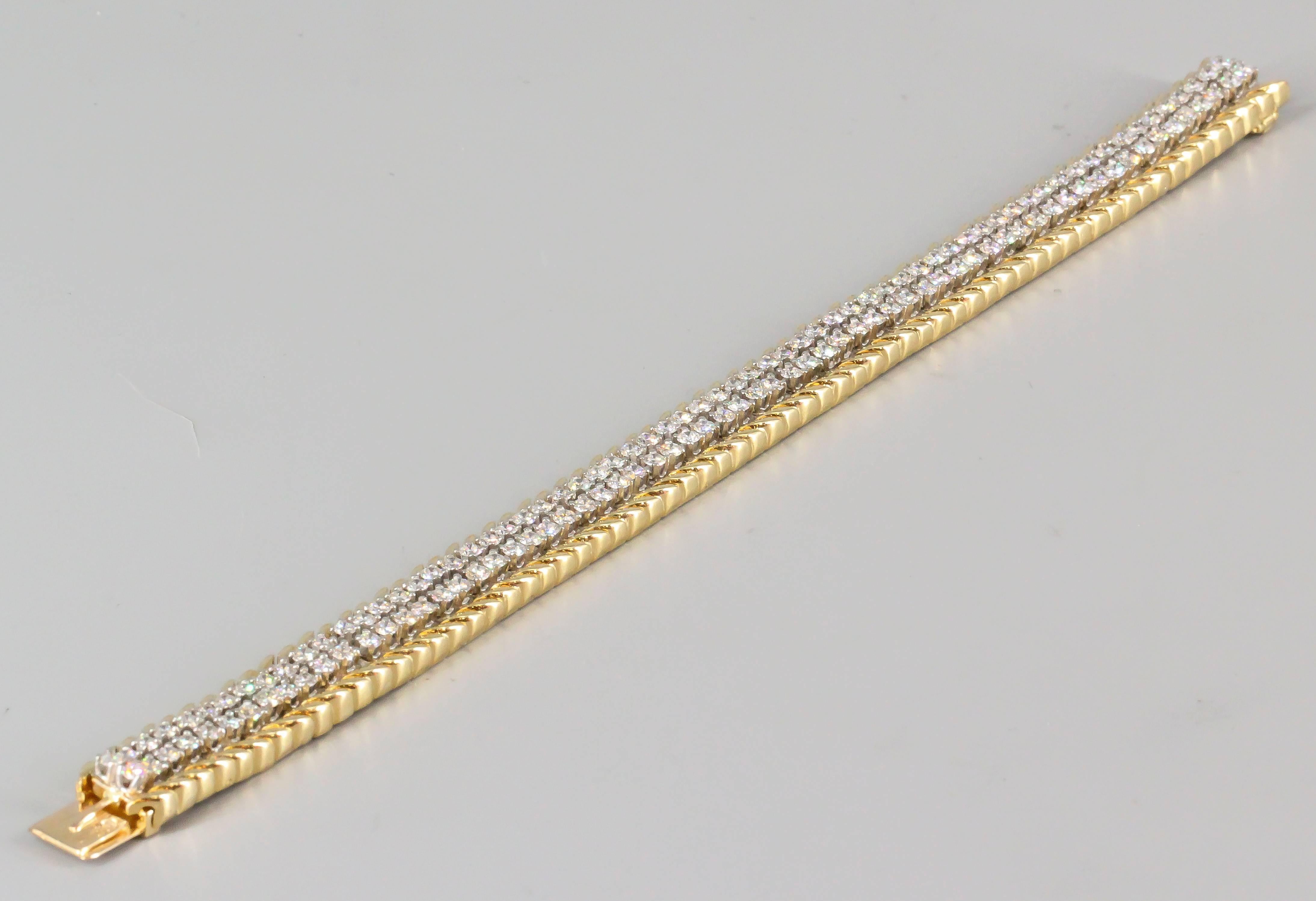 Refined diamond and 18K yellow gold link bracelet by Verdura. It features two rows of very high grade round brilliant cut diamonds, approx. 8.0cts total weight. Beautifully made and highly stylish.

Hallmarks: Verdura, French 18K gold and platinum