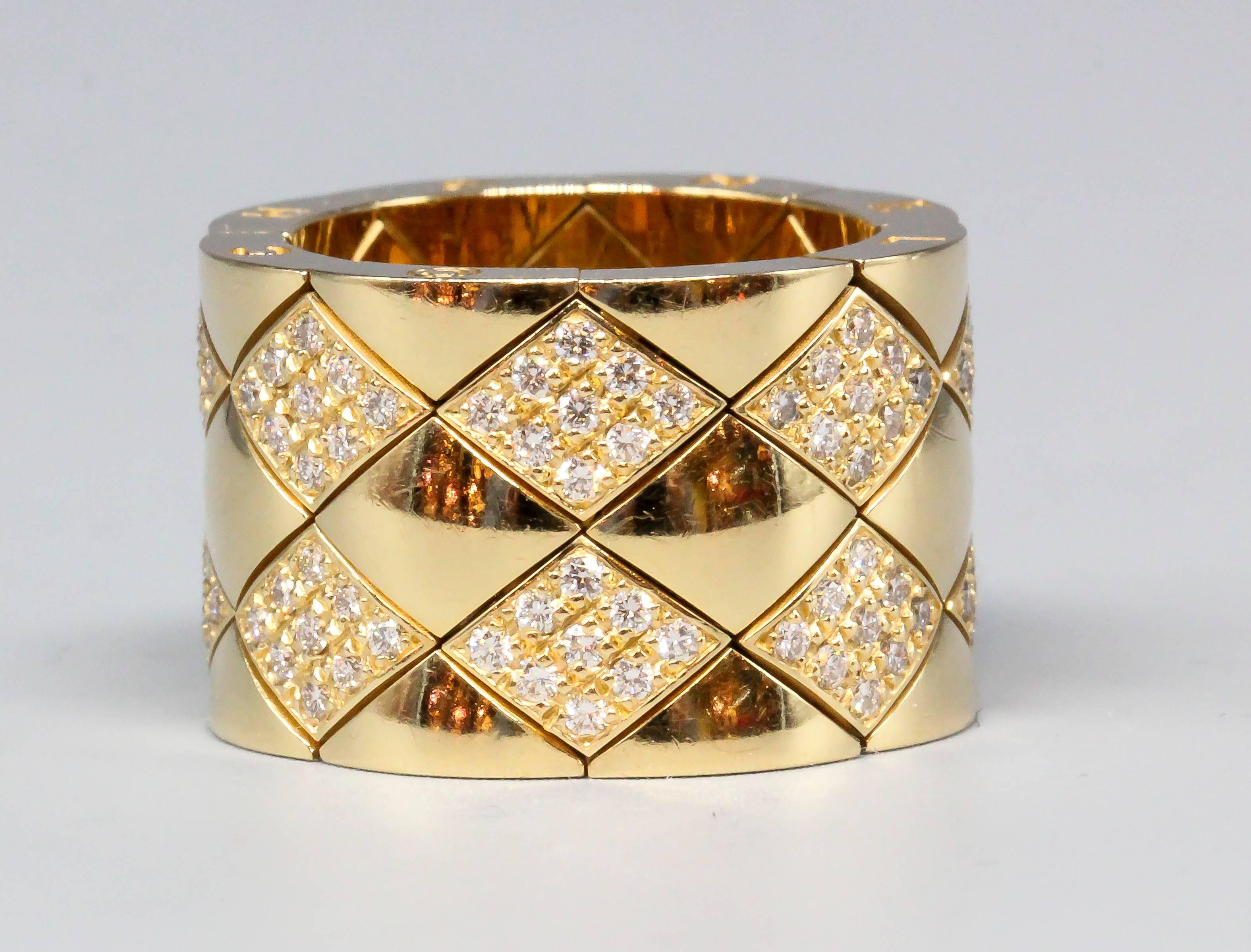 Elegant diamond and 18k yellow gold wide band from the 