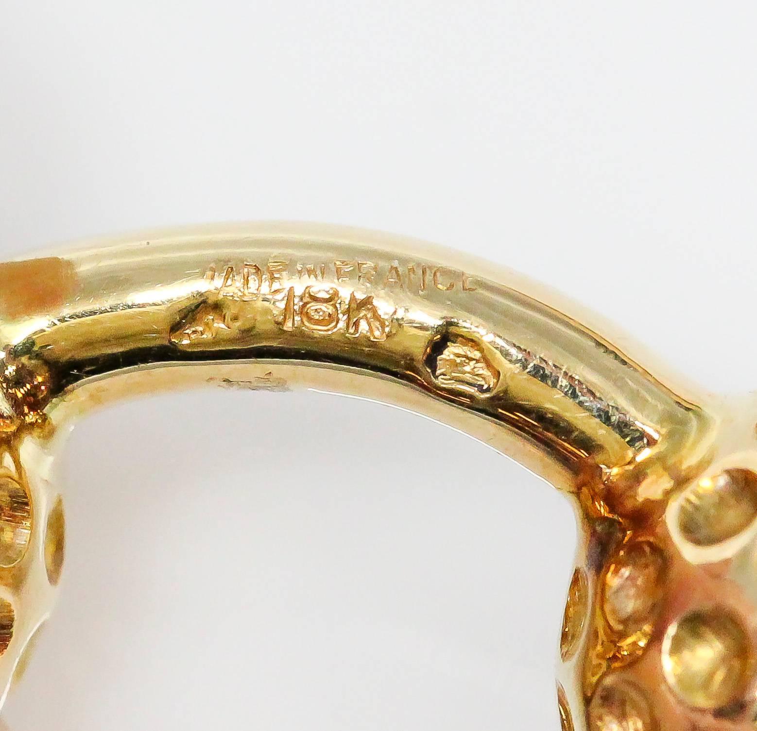 gold hermes cufflinks