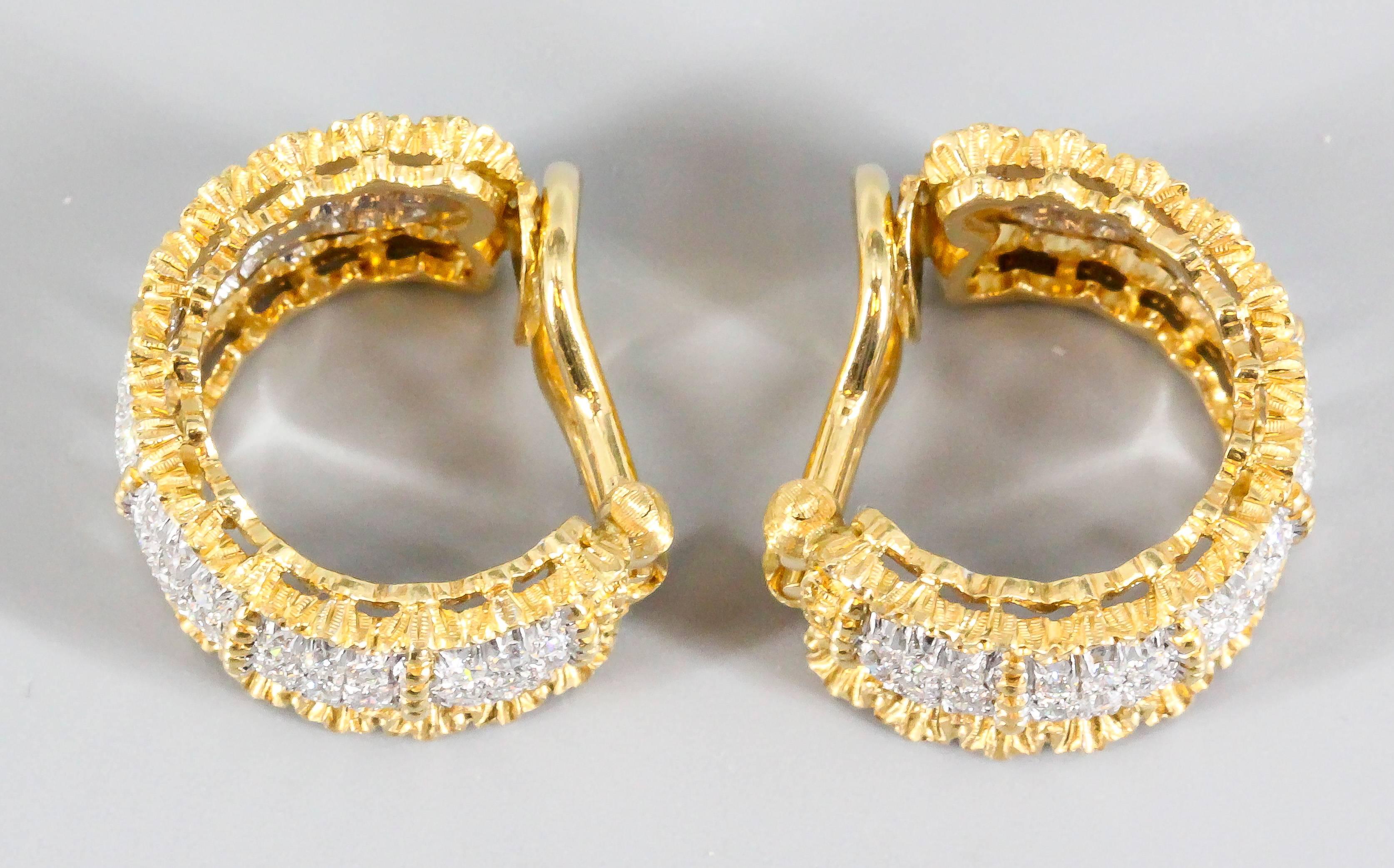 Elegant diamond and 18K white and yellow gold ear clips by Buccellati. They feature high grade round brilliant cut diamonds in a pave type setting. Beautiful intricate workmanship customary to Buccellati.  A stunning and easy to wear set of