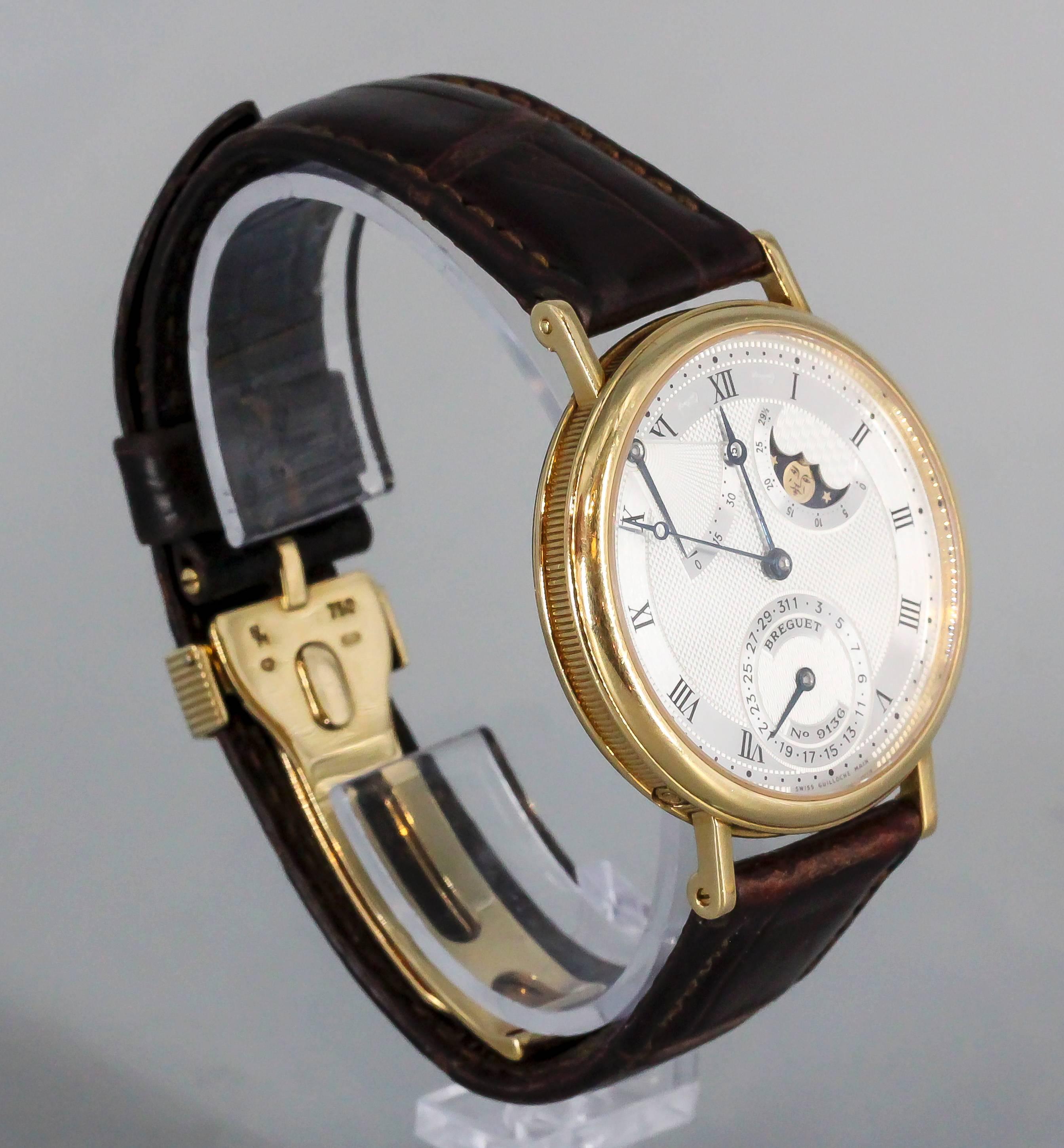 Elegant 18K yellow gold wrist watch from the 