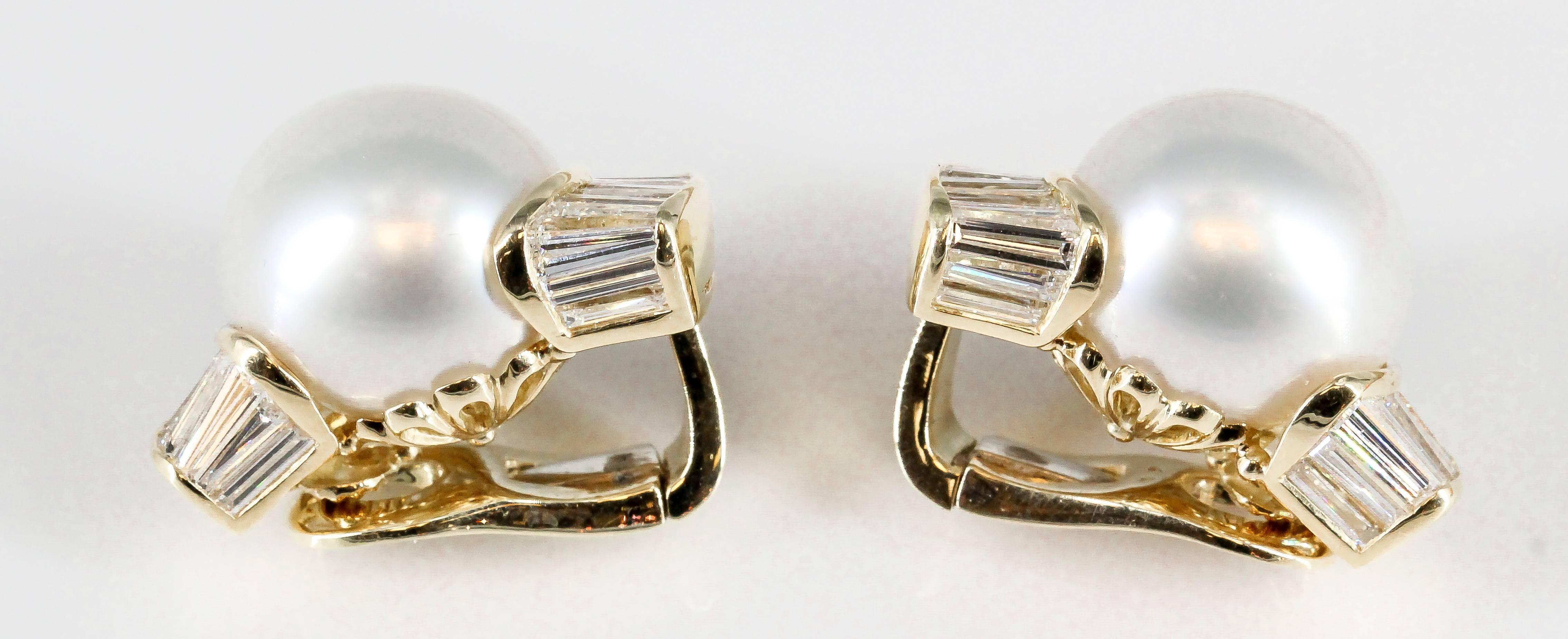 Timeless pearl, diamond and 18K yellow gold earrings by Bulgari. These wonderful earrings bear the "C" reference number given to special orders commissioned by Bulgari, thus making this pair most likely one of a kind. They feature