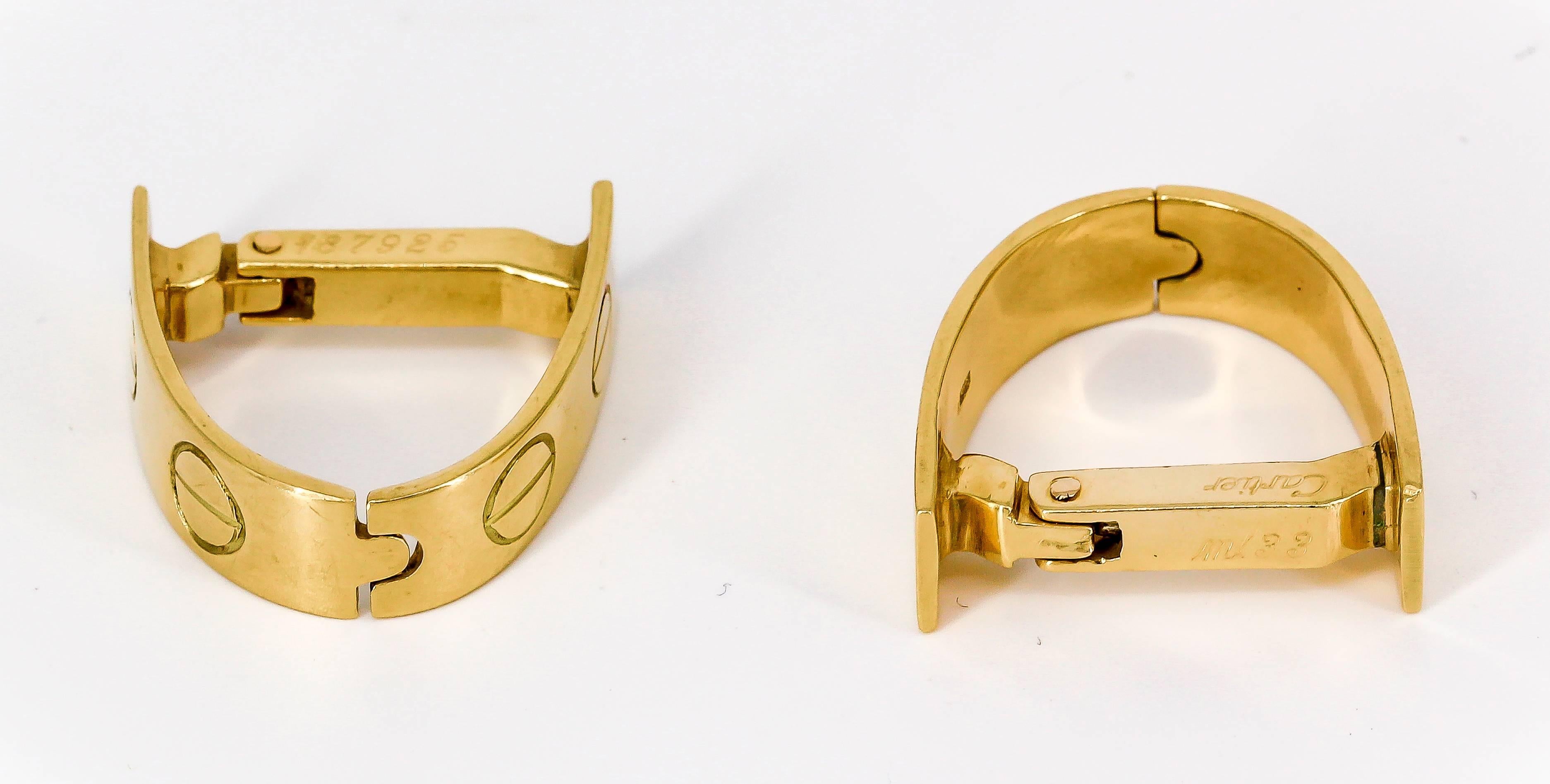 Handsome 18K yellow gold cufflinks from the "Love" collection by Cartier, circa 1980s.

Hallmarks: Cartier, 18k, reference numbers.