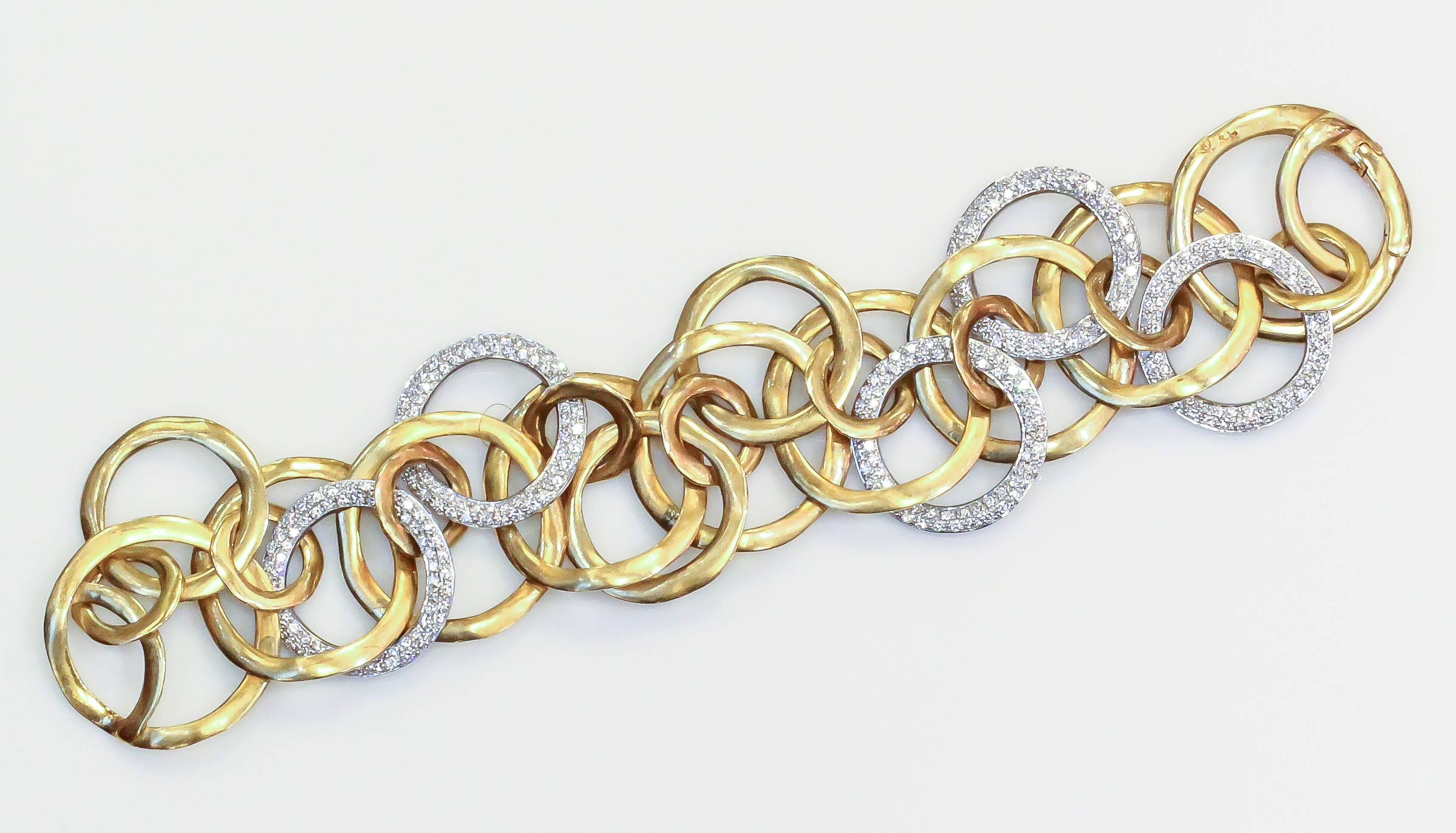 Whimsical diamond and 18K yellow gold link bracelet from the "Piatta" collection by Pomellato. It features high grade round brilliant cut diamonds, approx. 4.0cts total weight. Beautifully to wear and excellent workmanship. With paperwork