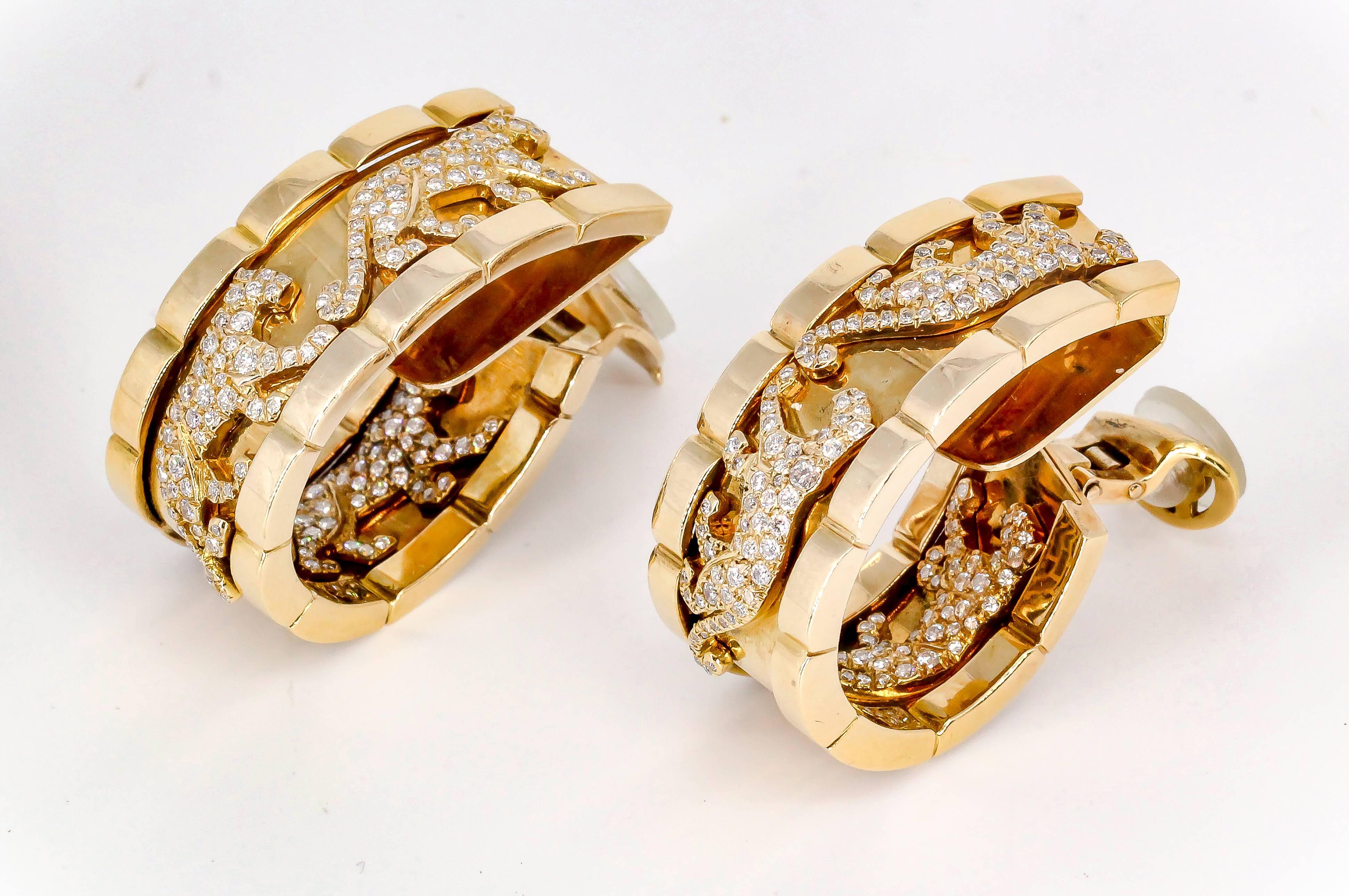 Striking diamond and 18K yellow gold inside out hoop earrings from the 