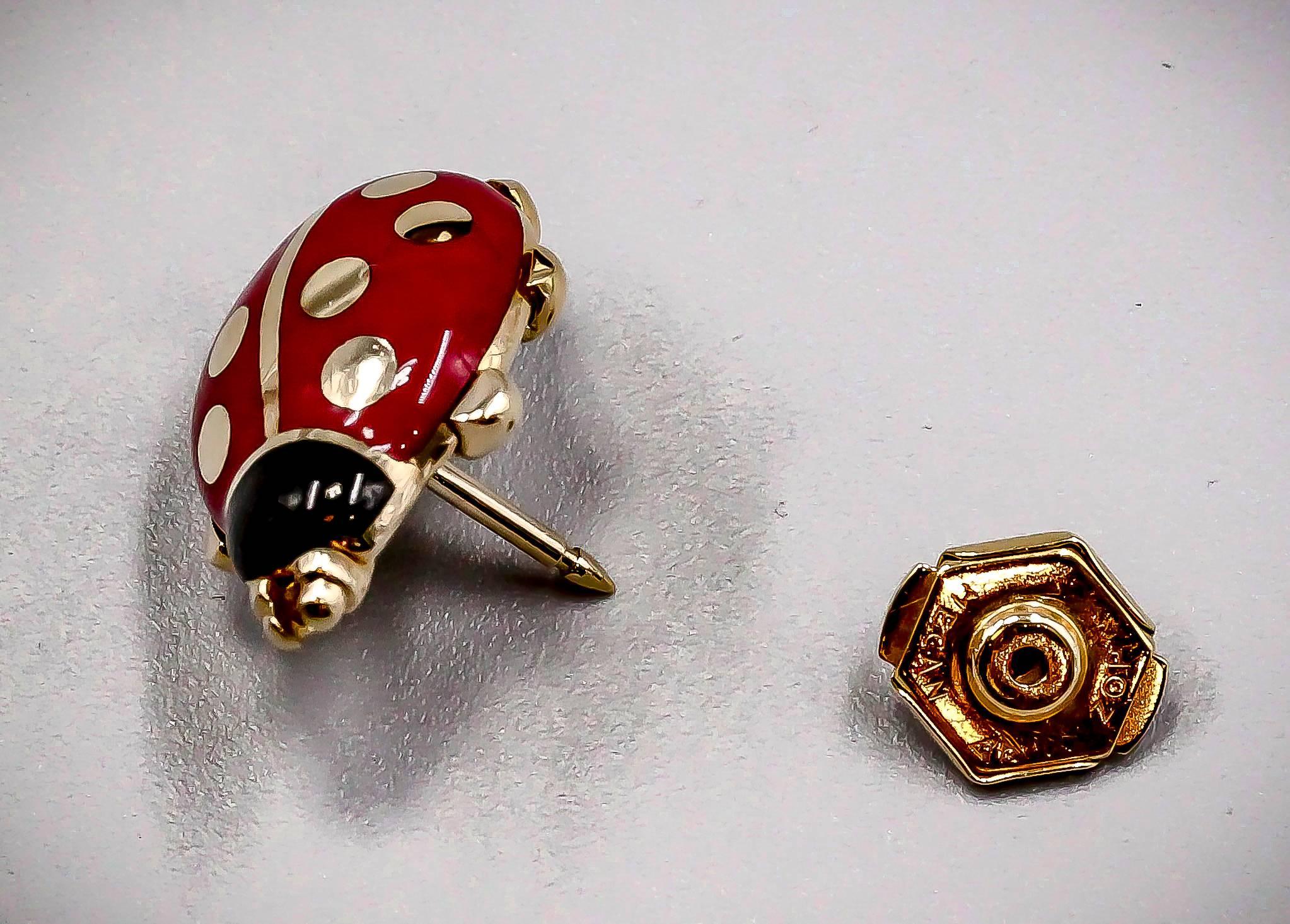 Whimsical 18K yellow gold and two color enamel pin by Cartier.  Designed as a ladybug, it features red and black enamel over 18k gold.  Circa 1990.

Hallmarks: Cartier, 1990, 750, reference numbers.
